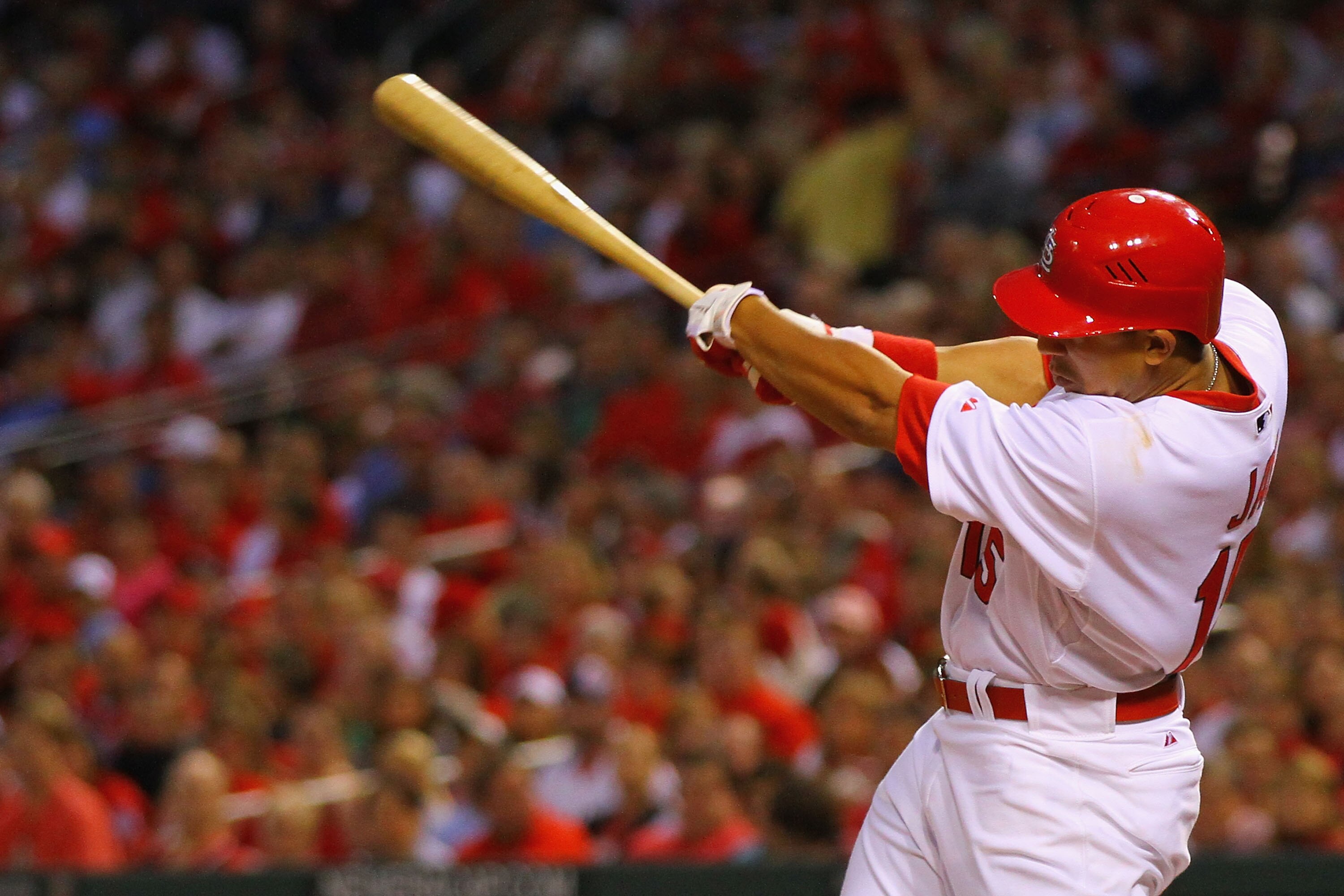 ST. LOUIS, MO - MAY 18: Jon Jay #15 of the St.Louis Cardinals hits a two-run single against the Houston Astros at Busch Stadium on May 18, 2011 in St. Louis, Missouri.  (Photo by Dilip Vishwanat/Getty Images)