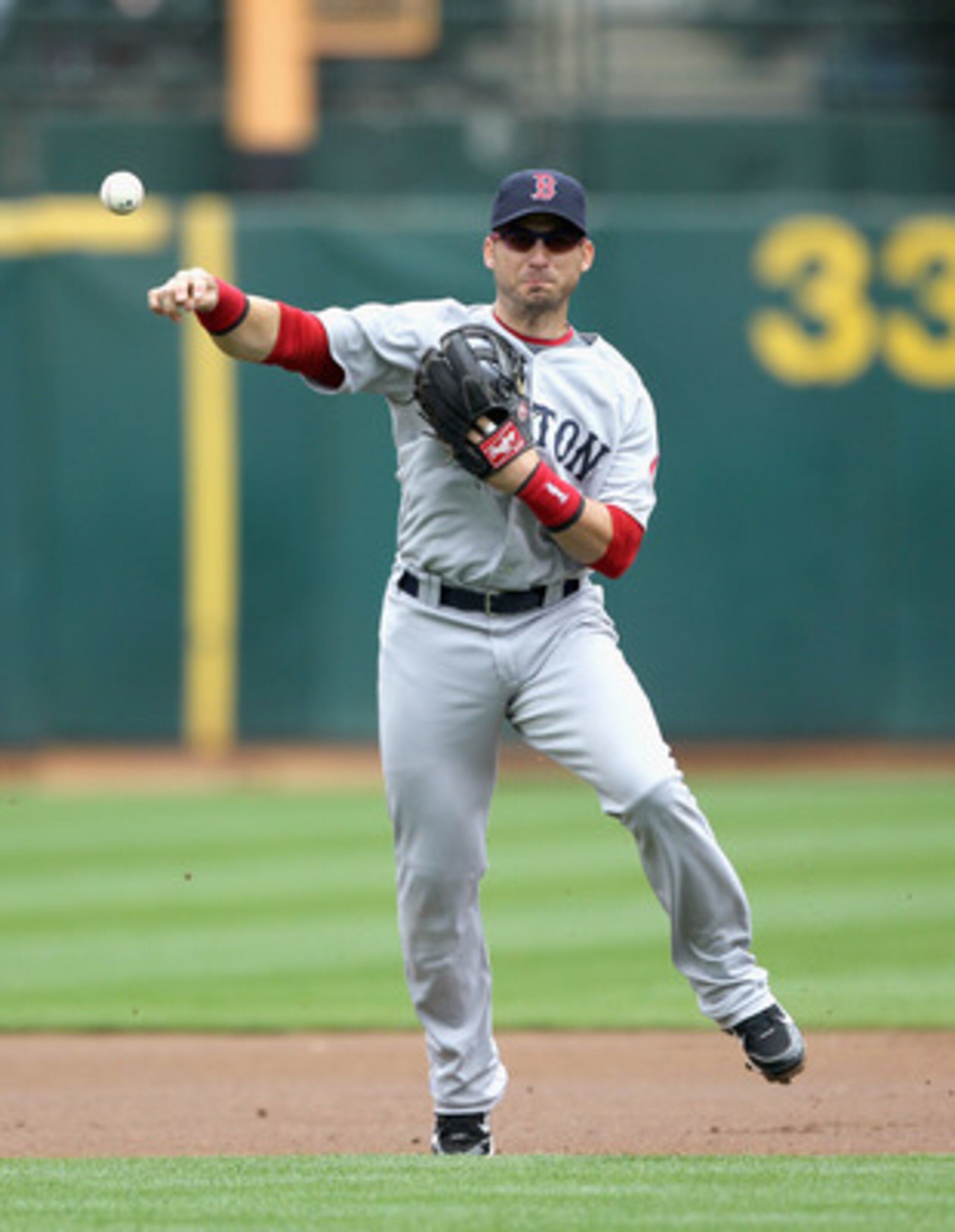 OAKLAND, CA - APRIL 20:  Marco Scutaro #10 of the Boston Red Sox in action against the Oakland Athletics at Oakland-Alameda County Coliseum on April 20, 2011 in Oakland, California.  (Photo by Ezra Shaw/Getty Images)
