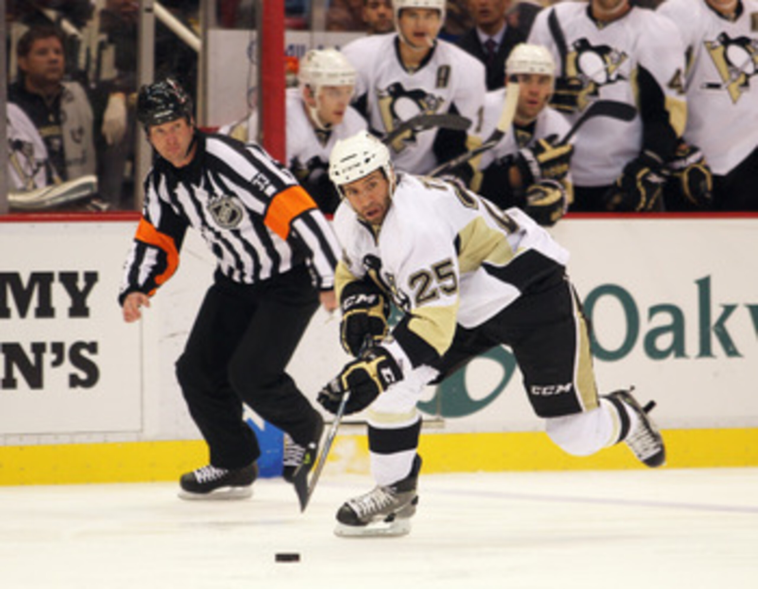 DETROIT, MI - OCTOBER 03:  Max Talbot #25 of the Pittsburgh Penguins skates in on a break in a preseason game against the Detroit Red Wings on October 3, 2010 at the Joe Louis Arena in Detroit, Michigan. The Penguins defeated the Red Wings 5-2. (Photo by 