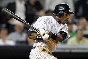 NEW YORK, NY - MAY 24:  Curtis Granderson #14 of the New York Yankees hits an RBI single in the ninth inning against the Toronto Blue Jays at Yankee Stadium on May 24, 2011 in the Bronx borough of New York City.  (Photo by Michael Heiman/Getty Images)