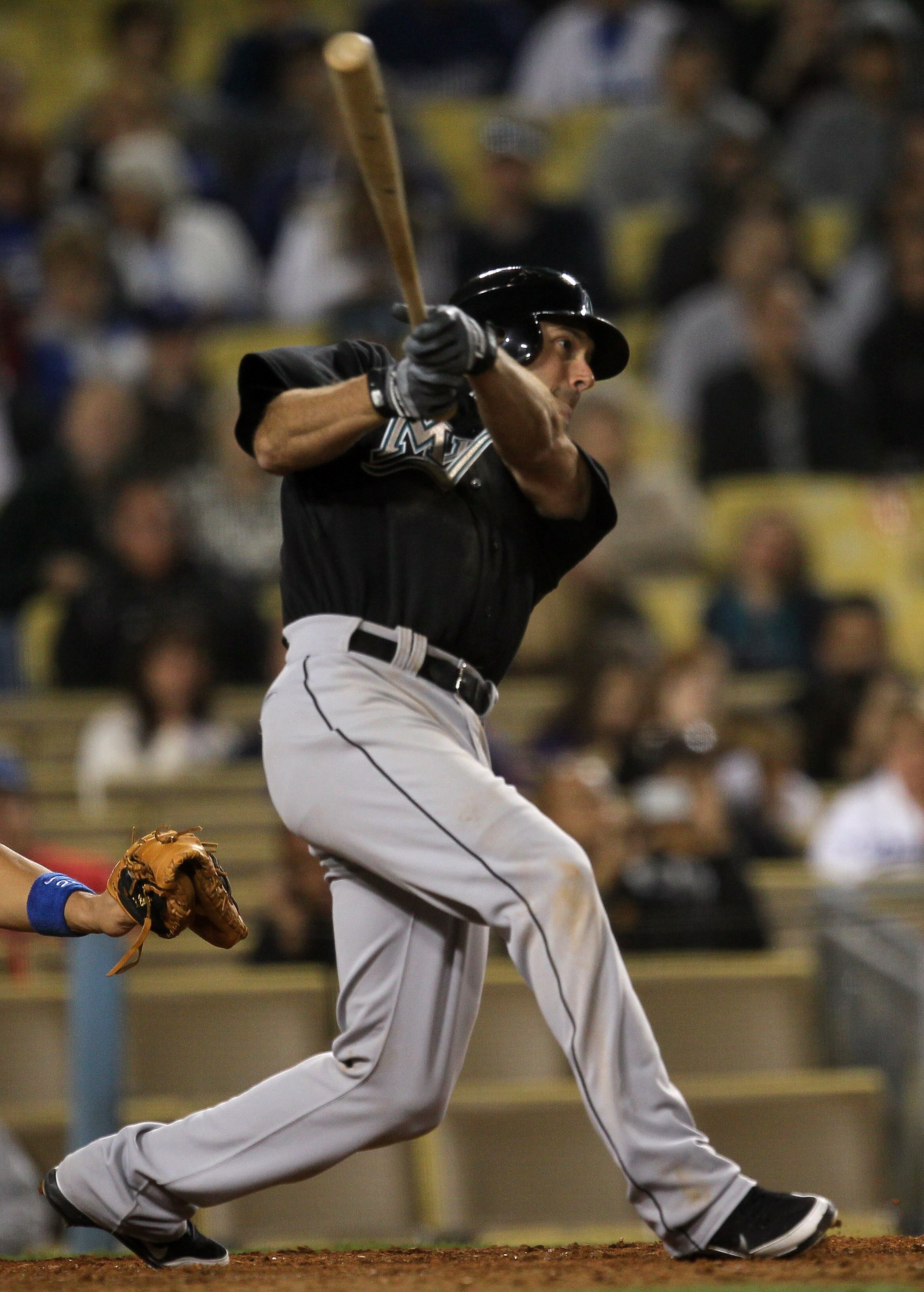 LOS ANGELES - MAY 28:  Greg Dobbs #29 of the Florida Marlins hits an RBI single in the seventh inning against the Los Angeles Dodgers on May 28, 2011 at Dodger Stadium in Los Angeles, California. The Marlins won 6-1.  (Photo by Stephen Dunn/Getty Images)