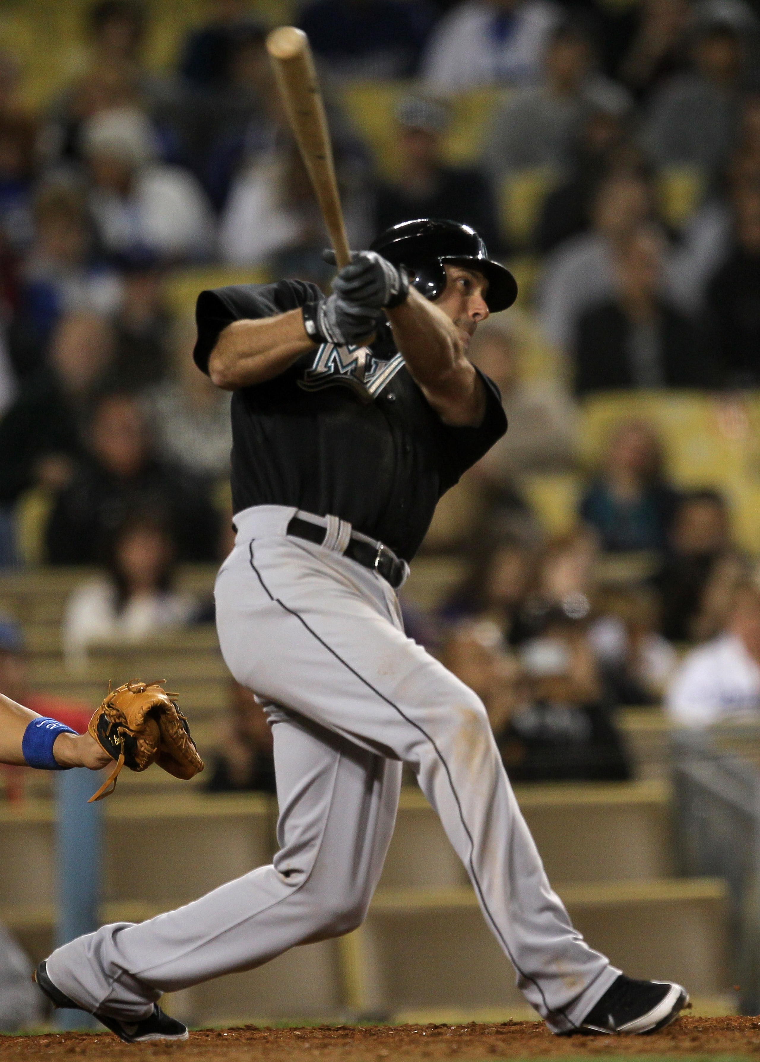 LOS ANGELES - MAY 28: Greg Dobbs #29 of the Florida Marlins hits an RBI single in the seventh inning against the Los Angeles Dodgers on May 28, 2011 at Dodger Stadium in Los Angeles, California. The Marlins won 6-1. (Photo by Stephen Dunn/Getty Images) LOS ANGELES - MAY 28: Greg Dobbs #29 of the Florida Marlins hits an RBI single in the seventh inning against the Los Angeles Dodgers on May 28, 2011 at Dodger Stadium in Los Angeles, California. The Marlins won 6-1. (Photo by Stephen Dunn/Getty Images)
