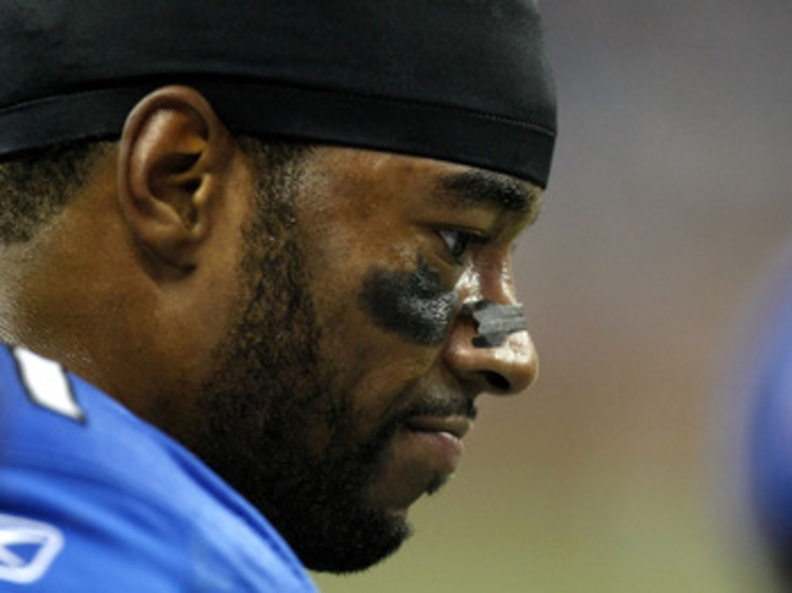DETROIT - DECEMBER 20:  Calvin Johnson #81 of the Detroit Lions looks on from the sideline while playing the Arizona Cardinals on December 20, 2009 at Ford Field in Detroit, Michigan.  (Photo by Gregory Shamus/Getty Images)