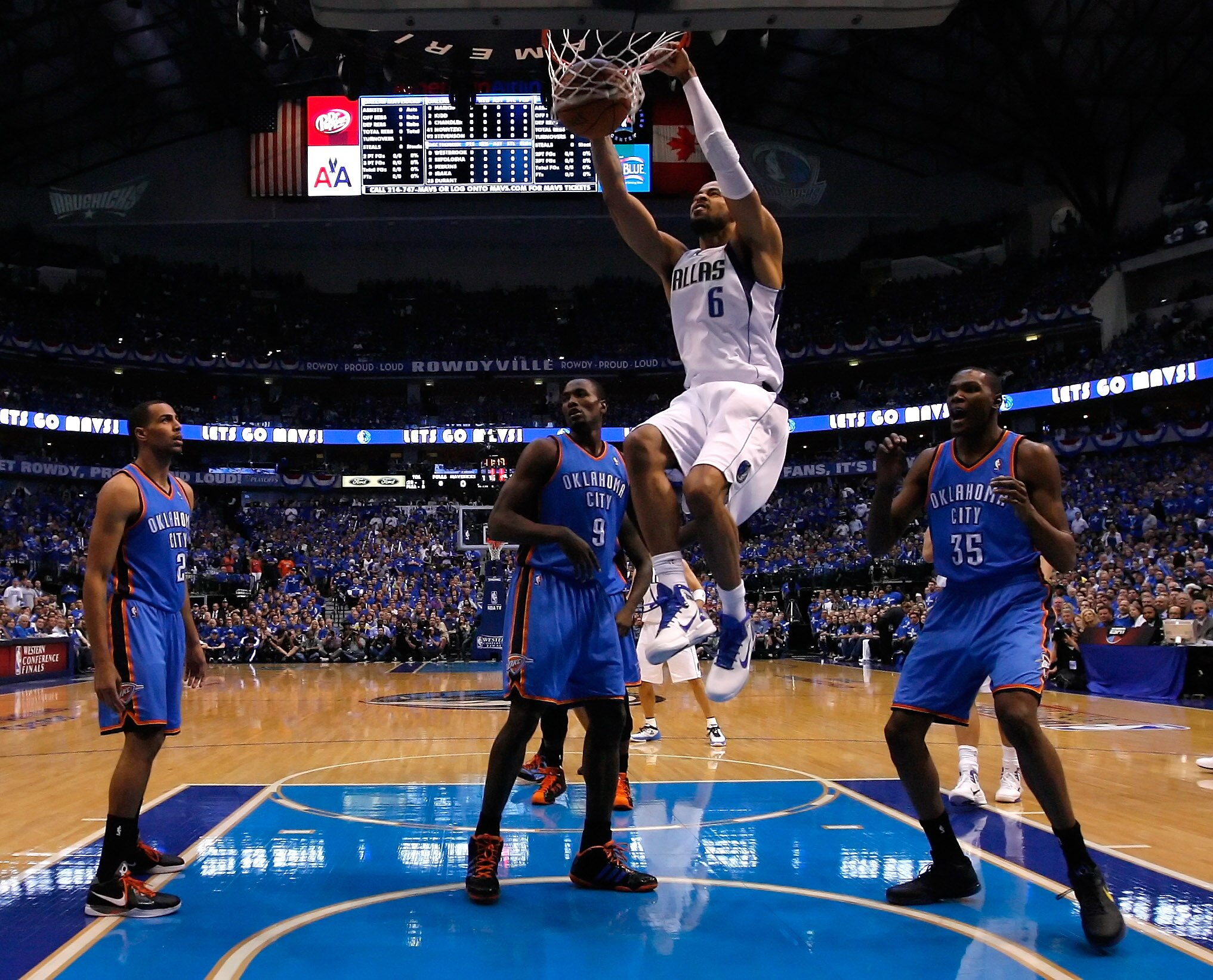DALLAS, TX - MAY 17:  Tyson Chandler #6 of the Dallas Mavericks dunks the ball in the first half in front of Serge Ibaka #9 of the Oklahoma City Thunder in Game One of the Western Conference Finals during the 2011 NBA Playoffs at American Airlines Center