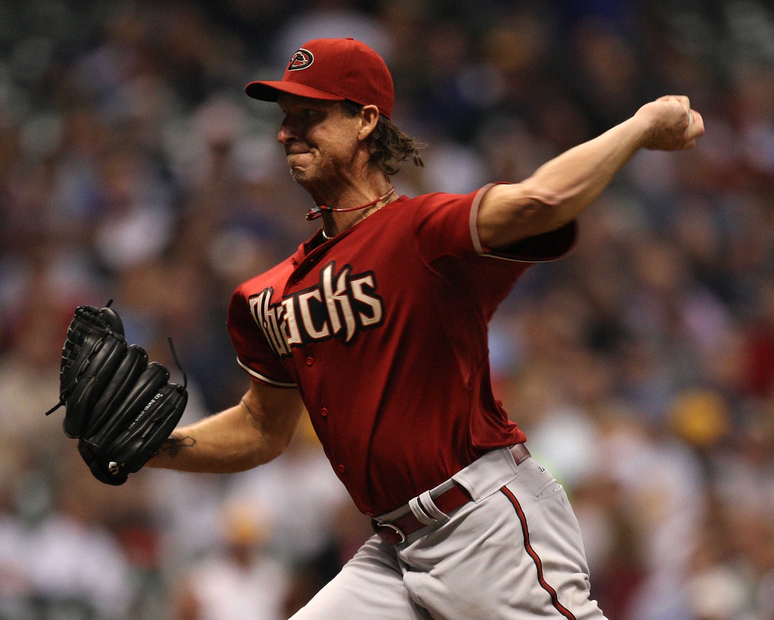 MILWAUKEE - JUNE 03:  Randy Johnson #51 of the Arizona Diamondbacks throws against the Milwaukee Brewers on June 3, 2008 at Miller Park in Milwaukee, Wisconsin. Johnson passed Roger Clemens for second place on the all-time strikeout list during tonight's