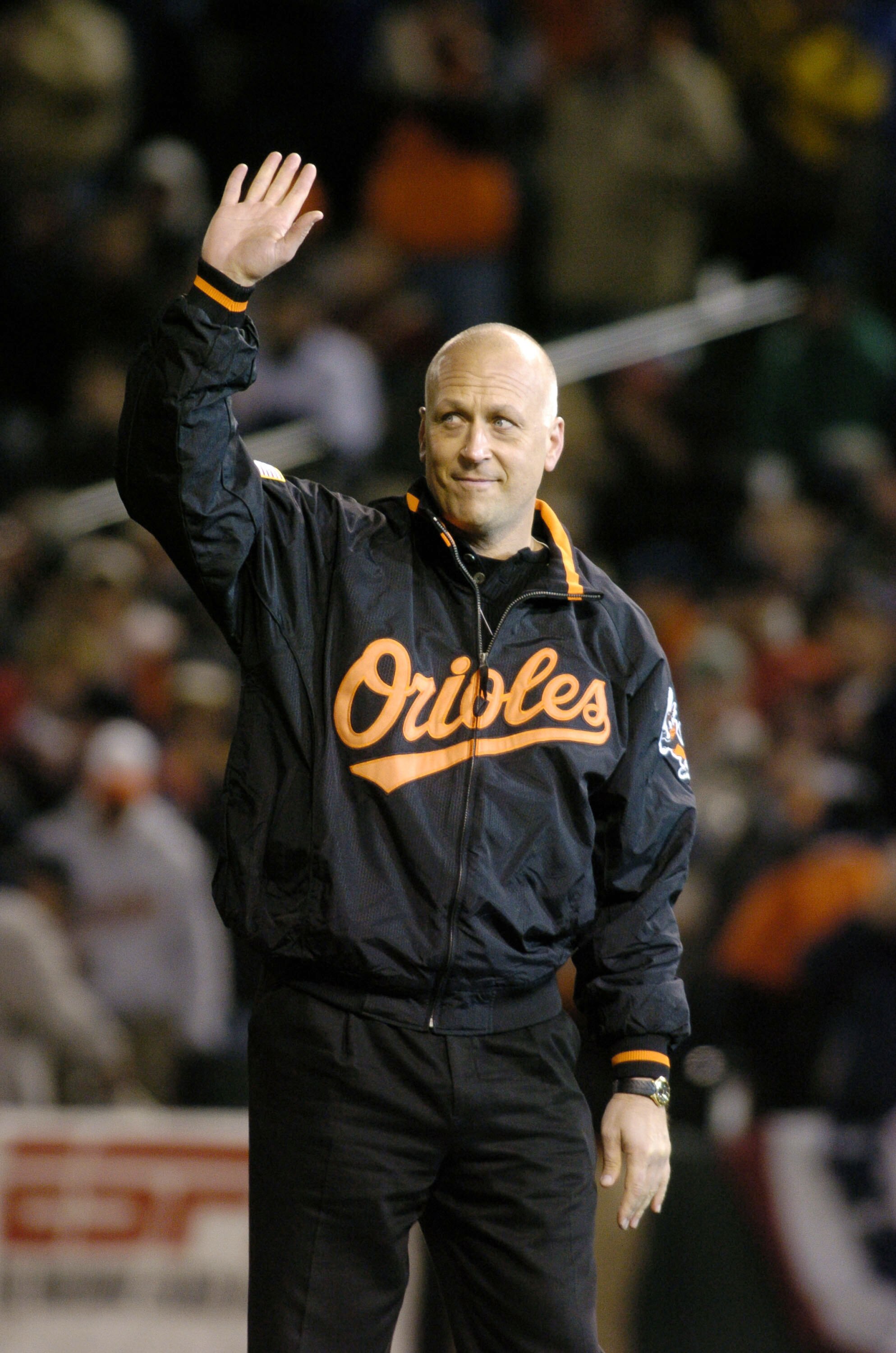 BALTIMORE, MD - APRIL 4:  Cal Ripken waves to the crowd before he throws out the ceremonial first pitch before the game between the Baltimore Orioles and the Boston Red Sox on April 4, 2004 at Camden Yards in Baltimore, Maryland.  (Photo by Greg Fiume/Get