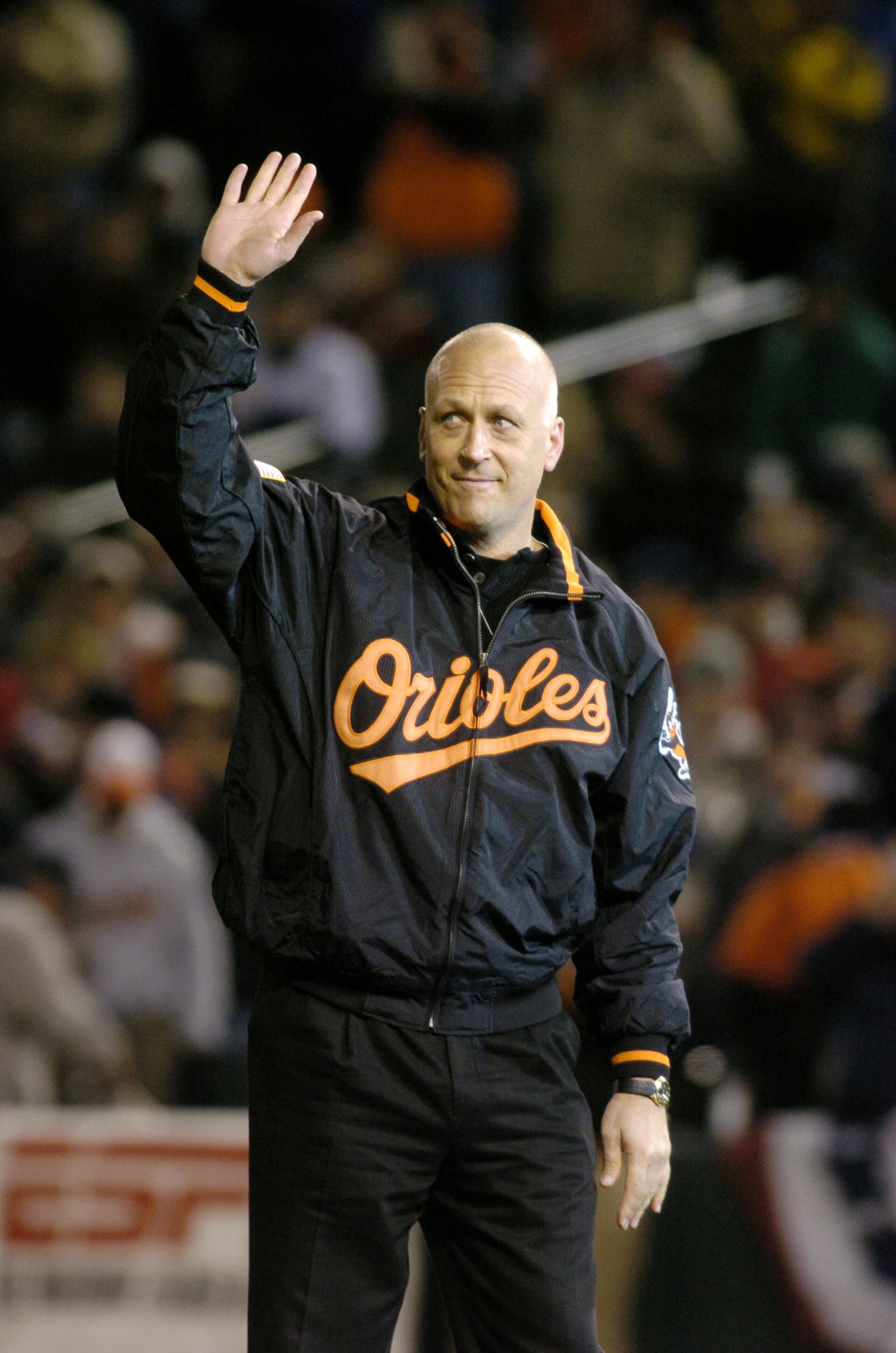 BALTIMORE, MD - APRIL 4:  Cal Ripken waves to the crowd before he throws out the ceremonial first pitch before the game between the Baltimore Orioles and the Boston Red Sox on April 4, 2004 at Camden Yards in Baltimore, Maryland.  (Photo by Greg Fiume/Get