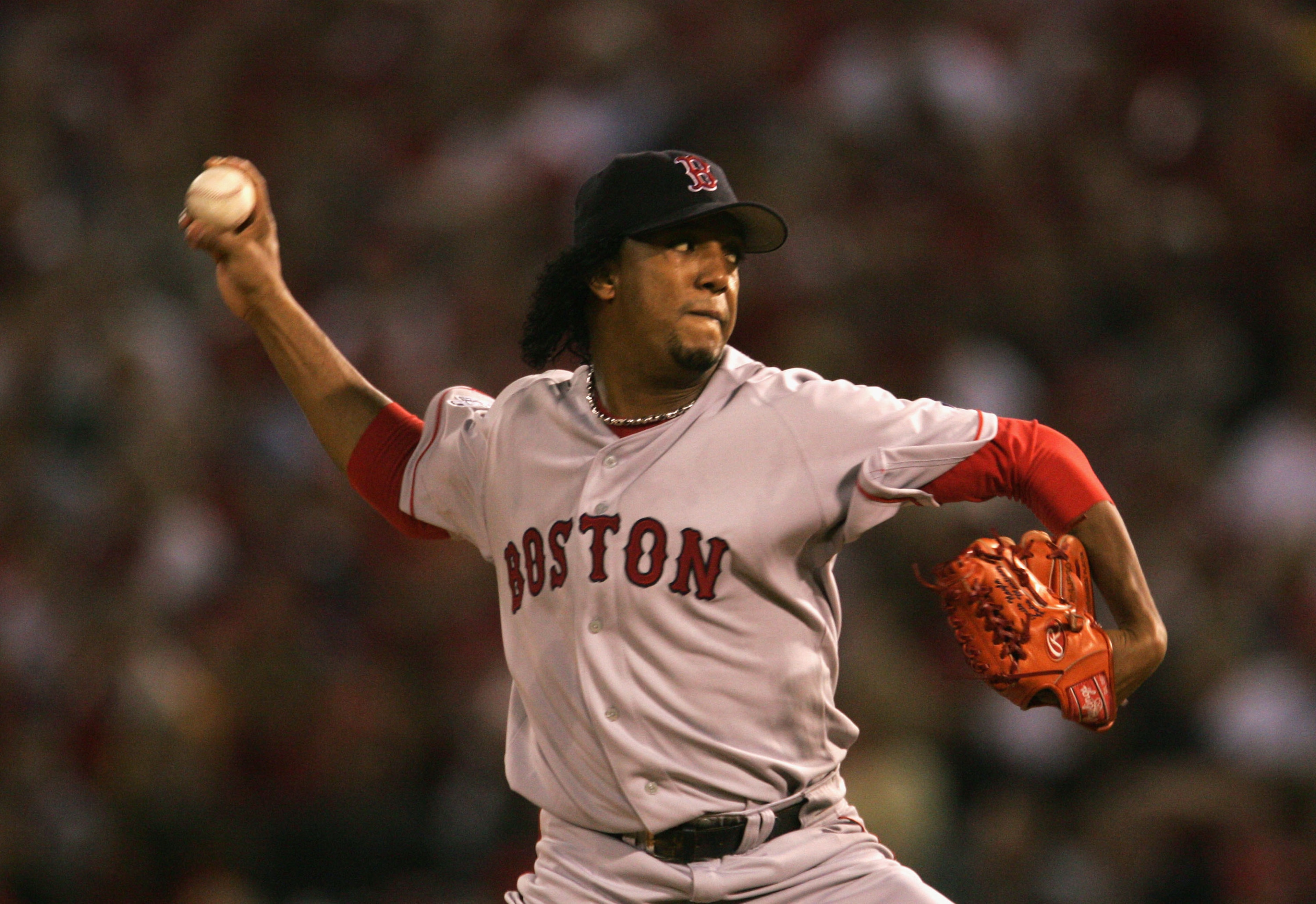 ST LOUIS - OCTOBER 26: Starting pitcher Pedro Martinez #45 of the Boston Red Sox throws a pitch against the St. Louis Cardinals during the first inning of game three of the World Series on October 26, 2004 at Busch Stadium in St. Louis, Missouri. (Photo ST LOUIS - OCTOBER 26: Starting pitcher Pedro Martinez #45 of the Boston Red Sox throws a pitch against the St. Louis Cardinals during the first inning of game three of the World Series on October 26, 2004 at Busch Stadium in St. Louis, Missouri. (Photo