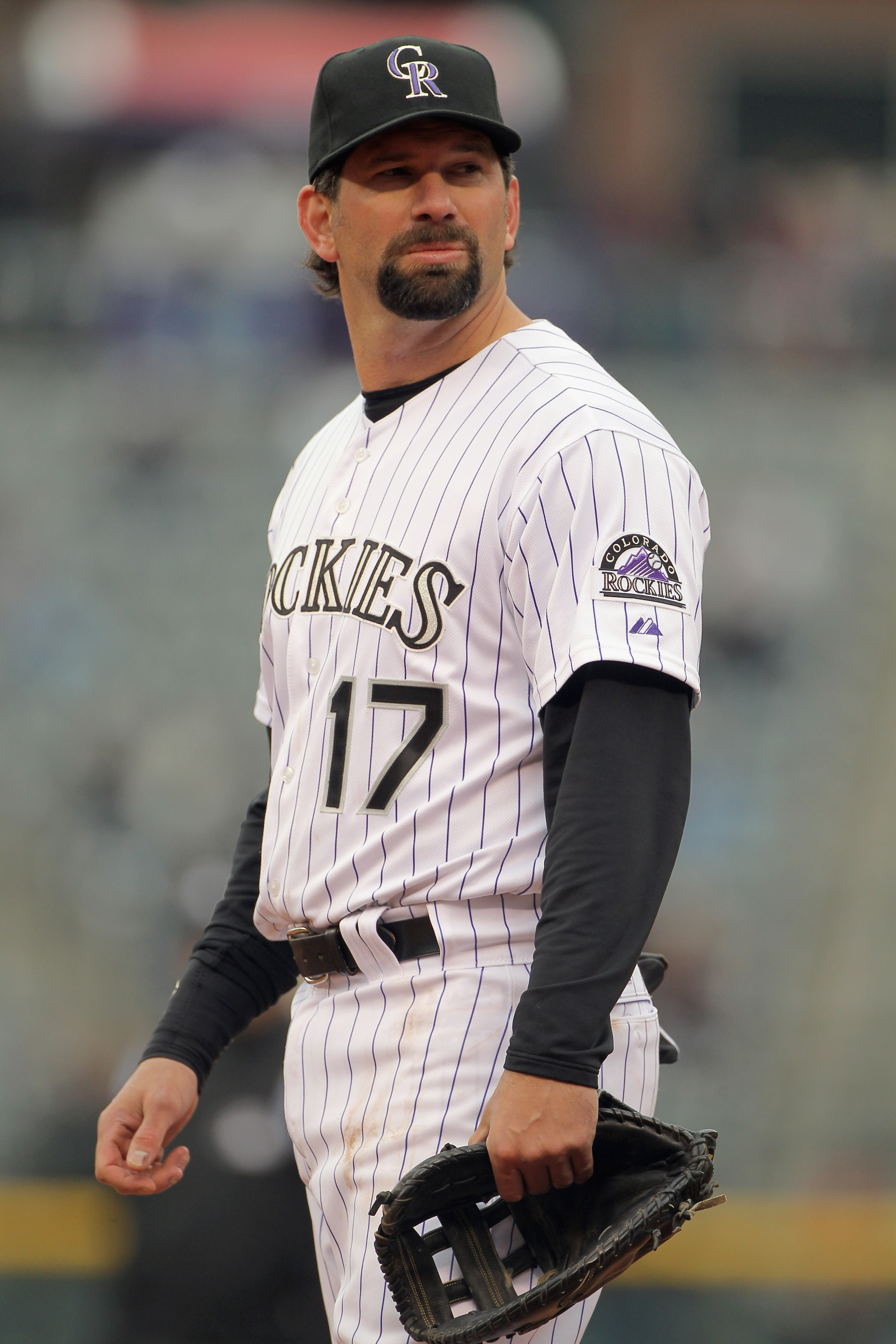 DENVER, CO - APRIL 06:  First baseman Todd Helton #17 of the Colorado Rockies plays defense against the Los Angeles Dodgers at Coors Field on April 6, 2011 in Denver, Colorado.  (Photo by Doug Pensinger/Getty Images)