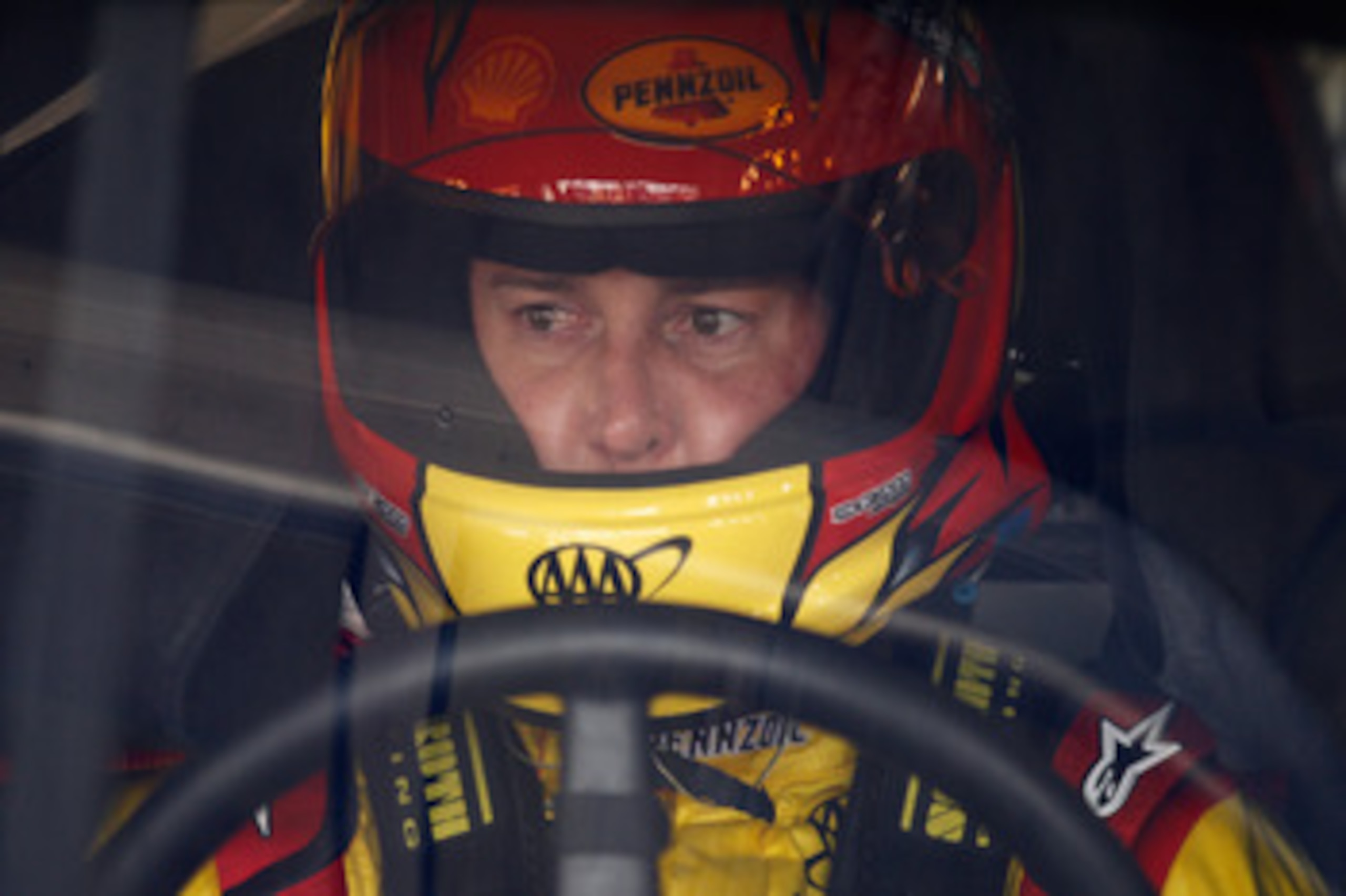 CHARLOTTE, NC - MAY 28:  Kurt Busch, driver of the #22 Shell/Pennzoil Dodge, sits in his car during practice for the NASCAR Sprint Cup Series Coca-Cola 600 at Charlotte Motor Speedway on May 28, 2011 in Charlotte, North Carolina.  (Photo by Chris Graythen