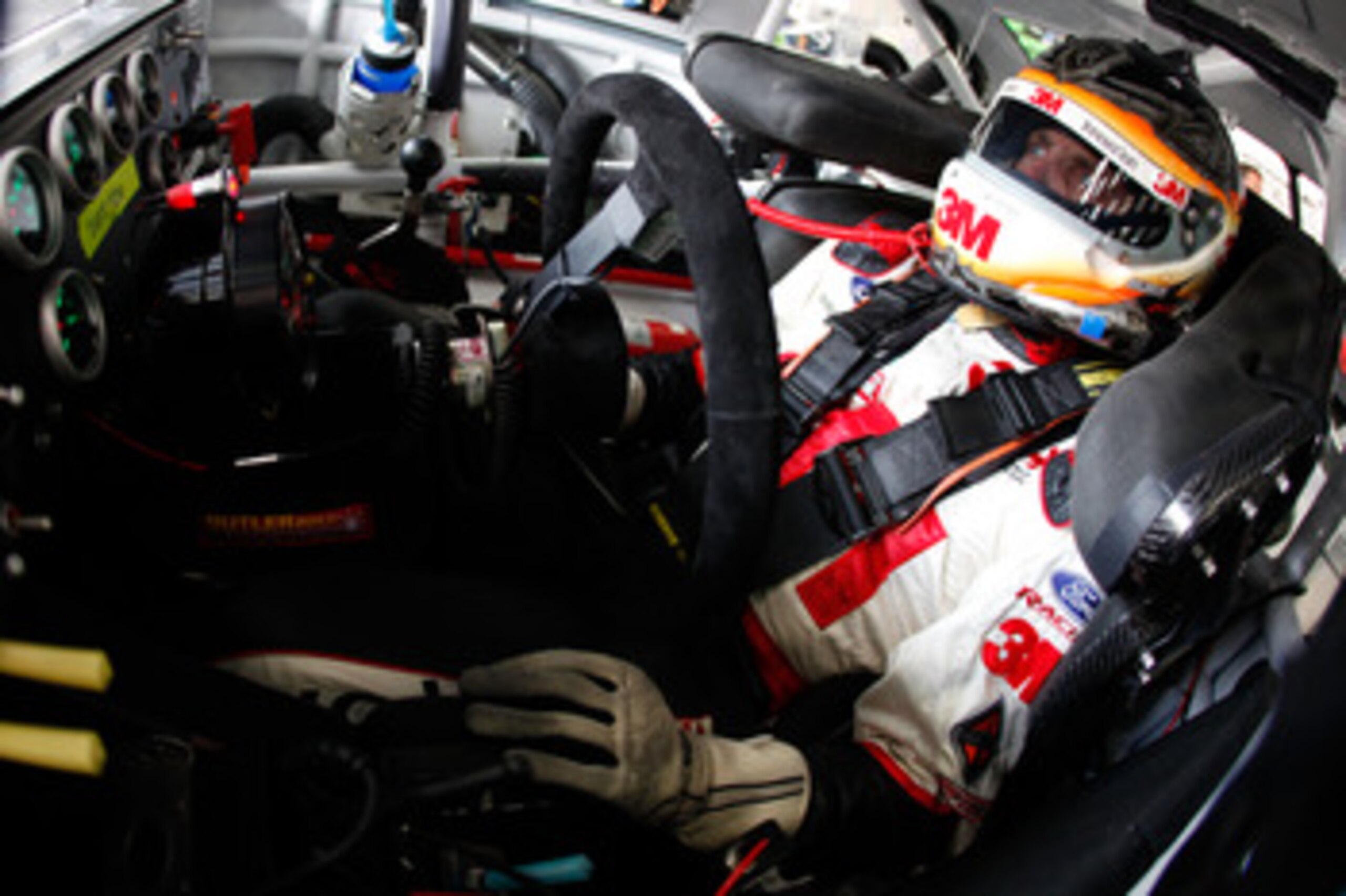 CHARLOTTE, NC - MAY 28:  Greg Biffle, driver of the #16 3M Ford, sits in his car during practice for the NASCAR Sprint Cup Series Coca-Cola 600 at Charlotte Motor Speedway on May 28, 2011 in Charlotte, North Carolina.  (Photo by Chris Graythen/Getty Image