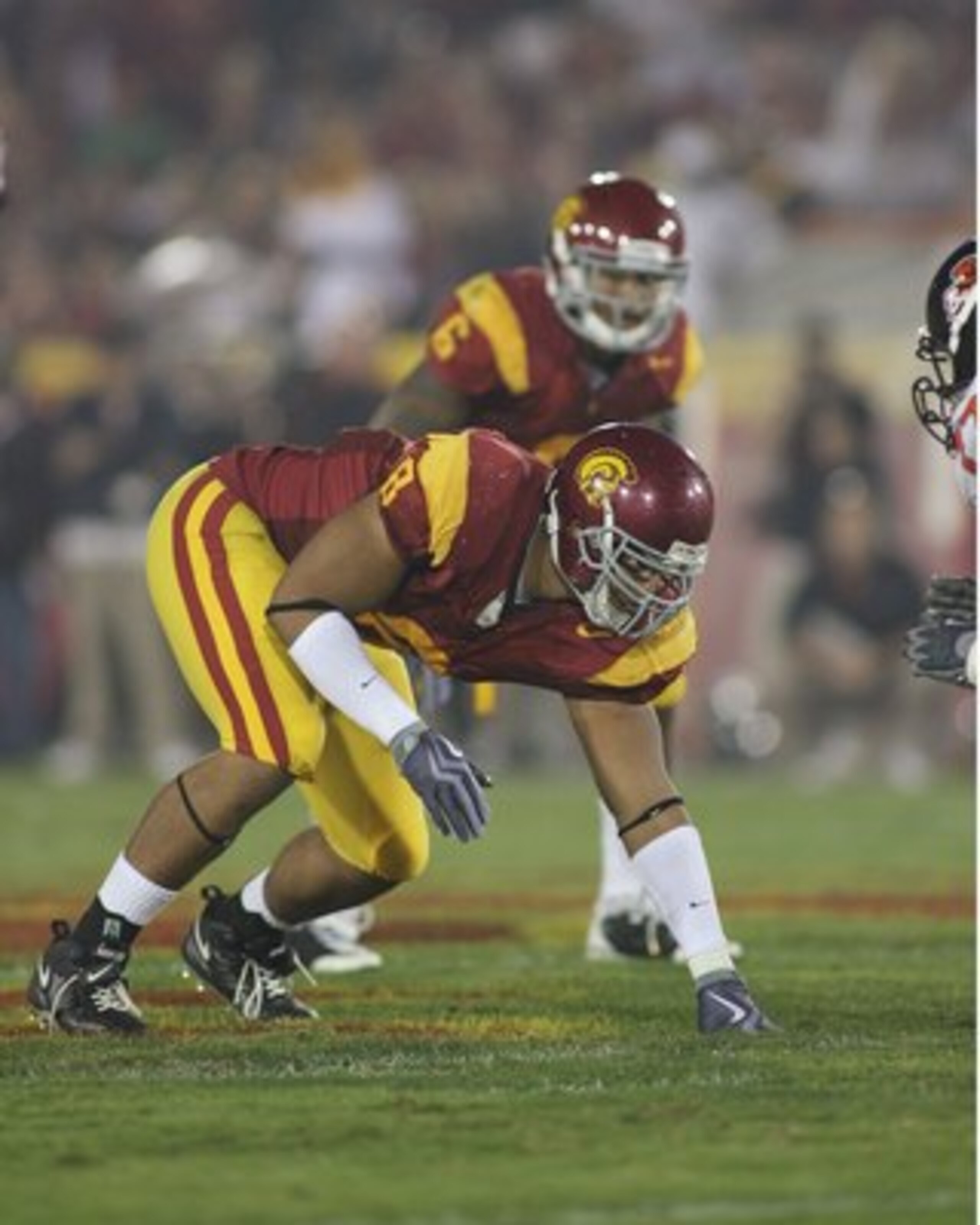 LOS ANGELES, CA - OCTOBER 24:  Nick Perry #8 of the USC Trojans lines up against the Oregon State Beavers on October 24, 2009 at the Los Angeles Coliseum in Los Angeles, California.  USC won 42-36.  (Photo by Jeff Golden/Getty Images)