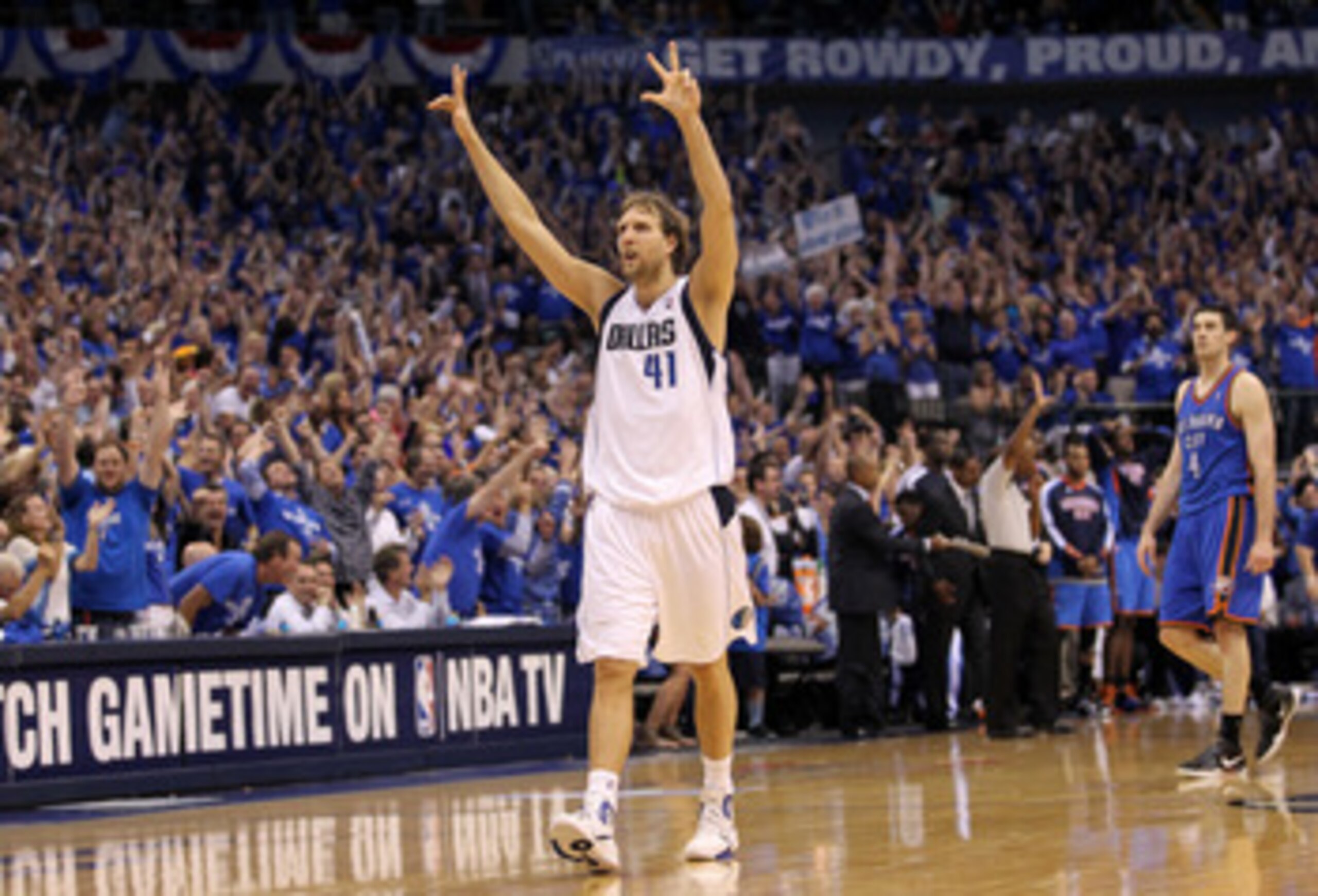 DALLAS, TX - MAY 25:  Dirk Nowitzki #41 of the Dallas Mavericks reacts after making a three-pointer in the fourth quarter while taking on the Oklahoma City Thunder in Game Five of the Western Conference Finals during the 2011 NBA Playoffs at American Airl