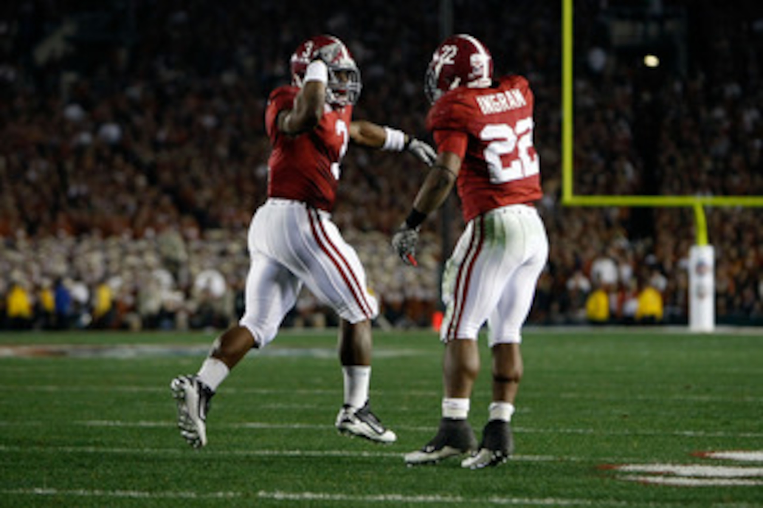 PASADENA, CA - JANUARY 07:  Running back Trent Richardson #3 of the Alabama Crimson Tide celebrates with Mark Ingram #22 after Richardson  runs for a 49-yard touchdown against the Texas Longhorns in the second quarter of the Citi BCS National Championship