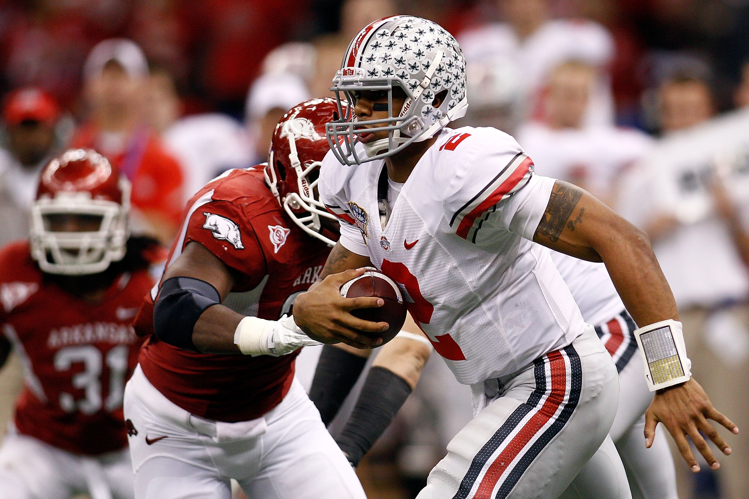 NEW ORLEANS, LA - JANUARY 04: Quarterback Terrelle Pryor #2 of the Ohio State Buckeyes looks to run against the Arkansas Razorbacks during the Allstate Sugar Bowl at the Louisiana Superdome on January 4, 2011 in New Orleans, Louisiana. (Photo by Chris G NEW ORLEANS, LA - JANUARY 04: Quarterback Terrelle Pryor #2 of the Ohio State Buckeyes looks to run against the Arkansas Razorbacks during the Allstate Sugar Bowl at the Louisiana Superdome on January 4, 2011 in New Orleans, Louisiana. (Photo by Chris G