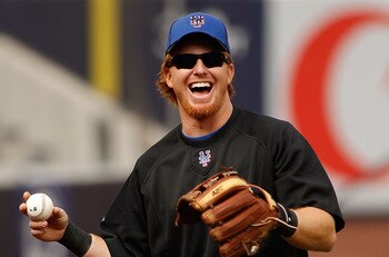 NEW YORK - MAY 21:  Justin Turner #2 of the New York Mets shares a laugh during warm-ups prior to the start of the game against the New York Yankees on May 21, 2011 at Yankee Stadium in the Bronx borough of New York City.  (Photo by Mike Stobe/Getty Image