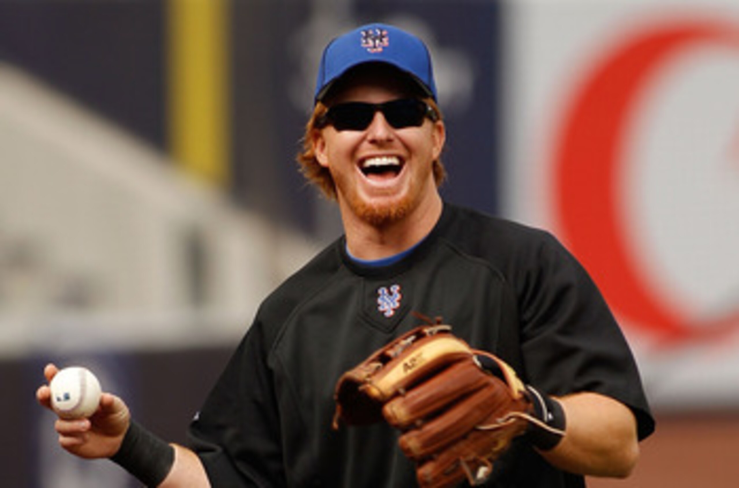 NEW YORK - MAY 21:  Justin Turner #2 of the New York Mets shares a laugh during warm-ups prior to the start of the game against the New York Yankees on May 21, 2011 at Yankee Stadium in the Bronx borough of New York City.  (Photo by Mike Stobe/Getty Image