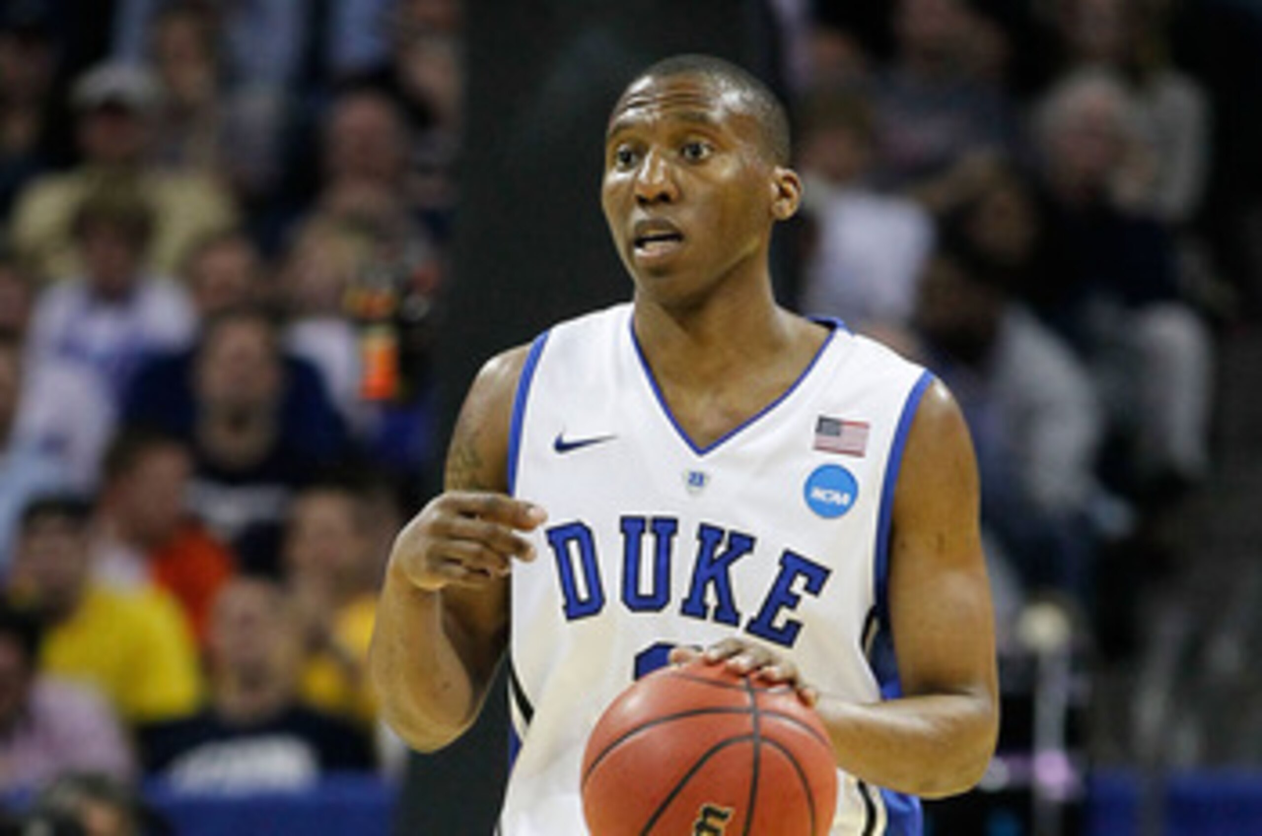 CHARLOTTE, NC - MARCH 20:  Nolan Smith #2 of the Duke Blue Devils moves the ball while taking on the Michigan Wolverines during the third round of the 2011 NCAA men's basketball tournament at Time Warner Cable Arena on March 20, 2011 in Charlotte, North C