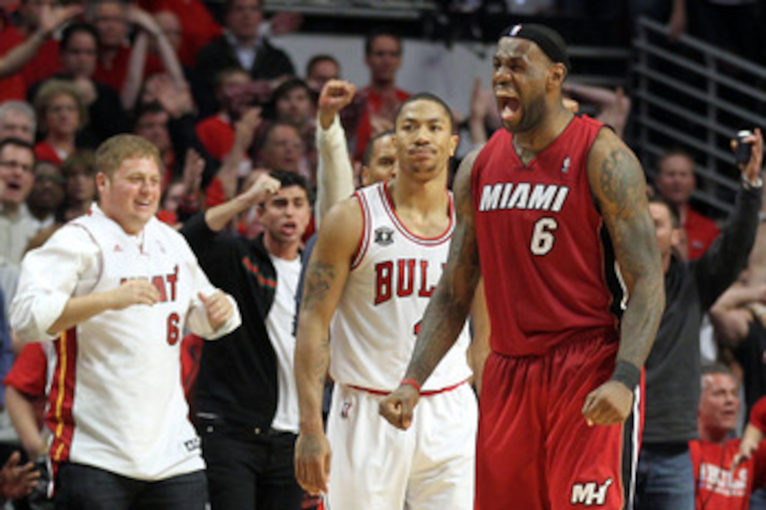 CHICAGO, IL - MAY 26:  LeBron James #6 of the Miami Heat celebrates after the Heat won 83-80 against Derrick Rose #1 of the Chicago Bulls in Game Five of the Eastern Conference Finals during the 2011 NBA Playoffs on May 26, 2011 at the United Center in Ch