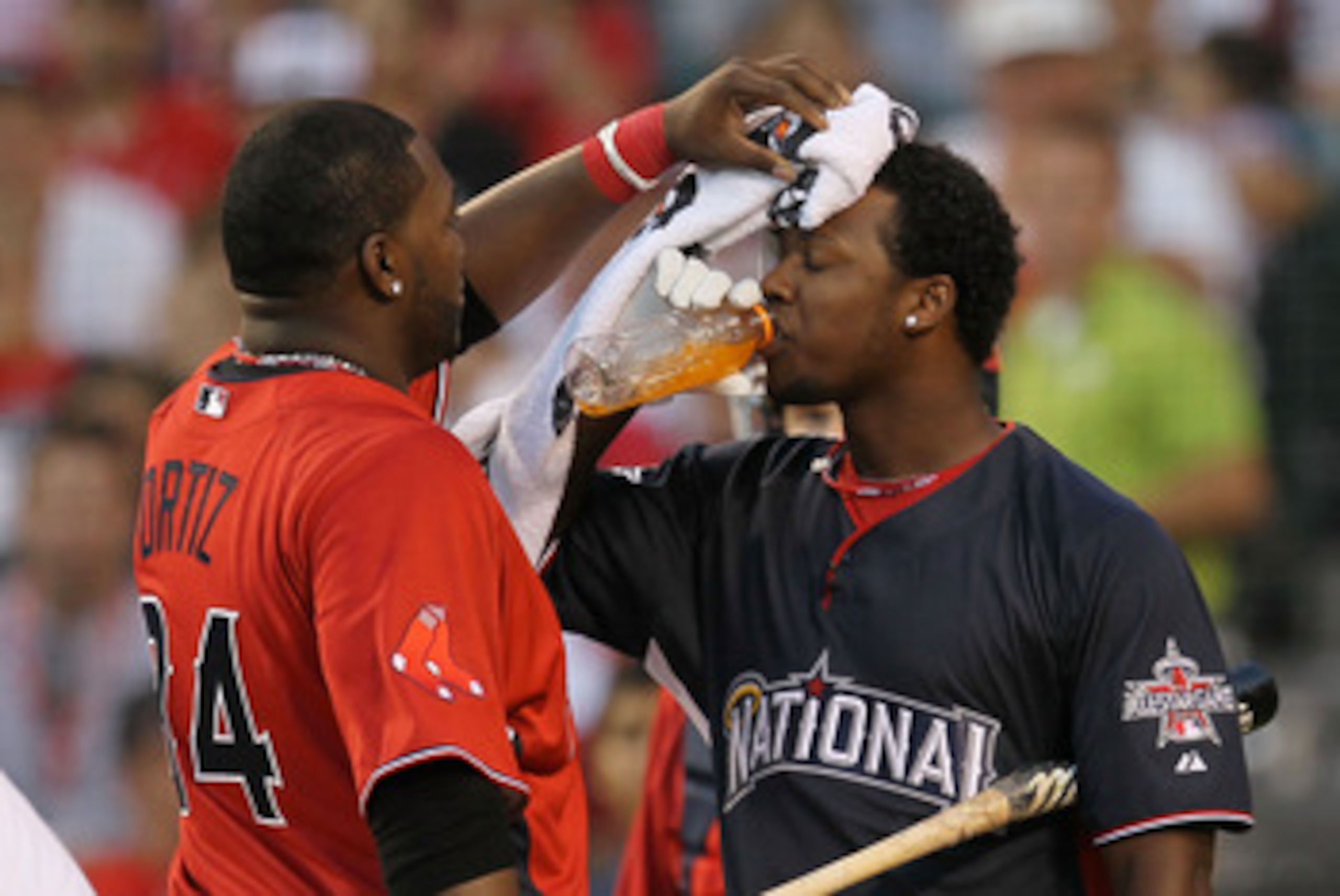 ANAHEIM, CA - JULY 12: American League All-Star David Ortiz #34 of the Boston Red Sox towels off National League All-Star Hanley Ramirez #2 of the Florida Marlins after the final round of the 2010 State Farm Home Run Derby during All-Star Weekend at Ange ANAHEIM, CA - JULY 12: American League All-Star David Ortiz #34 of the Boston Red Sox towels off National League All-Star Hanley Ramirez #2 of the Florida Marlins after the final round of the 2010 State Farm Home Run Derby during All-Star Weekend at Ange