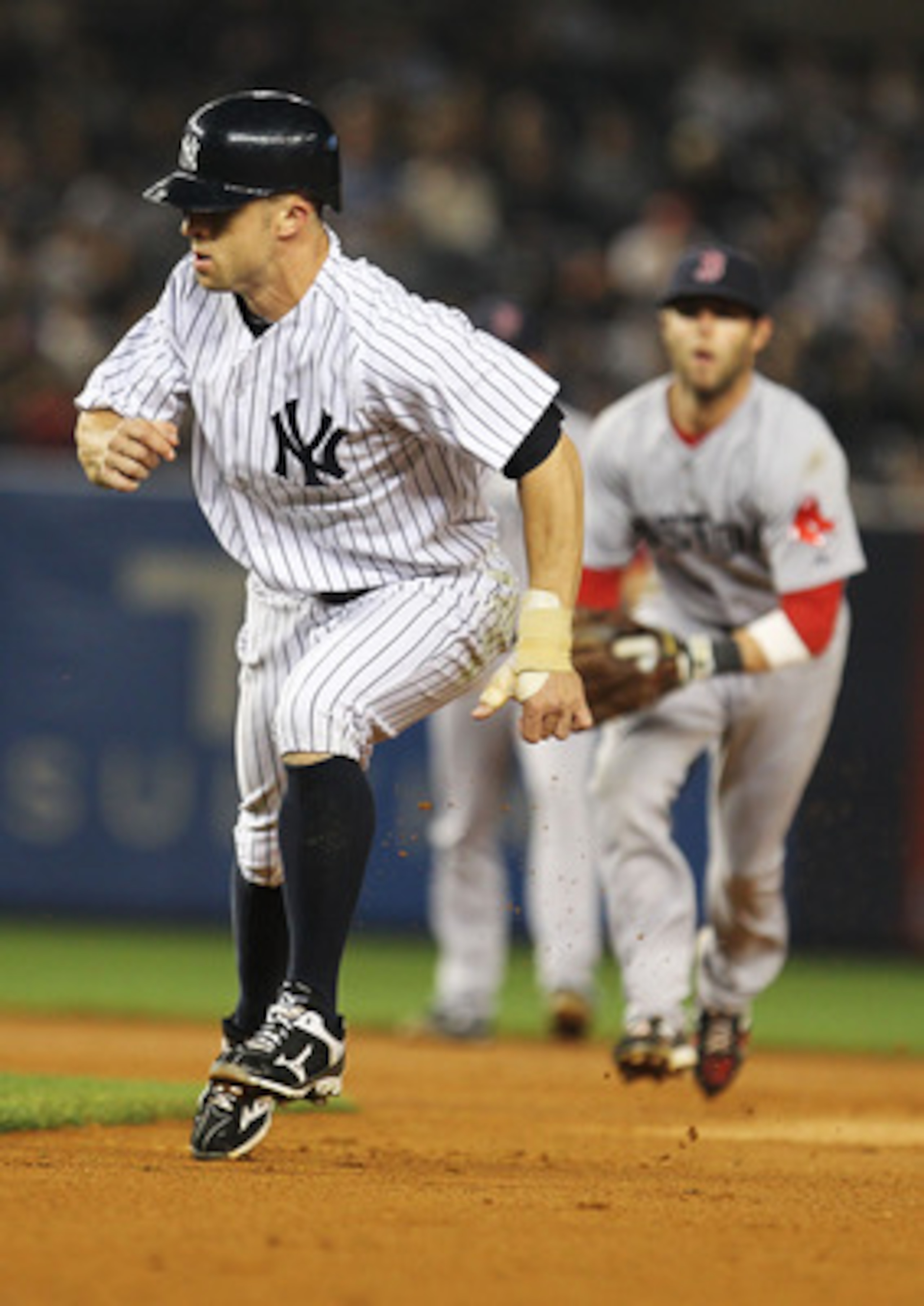 NEW YORK, NY - MAY 15: Brett Gardner #11 of the New York Yankees is caught in a run down against the Boston Red Sox during their game on May 15, 2011 at Yankee Stadium in the Bronx borough of New York City. (Photo by Al Bello/Getty Images) NEW YORK, NY - MAY 15: Brett Gardner #11 of the New York Yankees is caught in a run down against the Boston Red Sox during their game on May 15, 2011 at Yankee Stadium in the Bronx borough of New York City. (Photo by Al Bello/Getty Images)