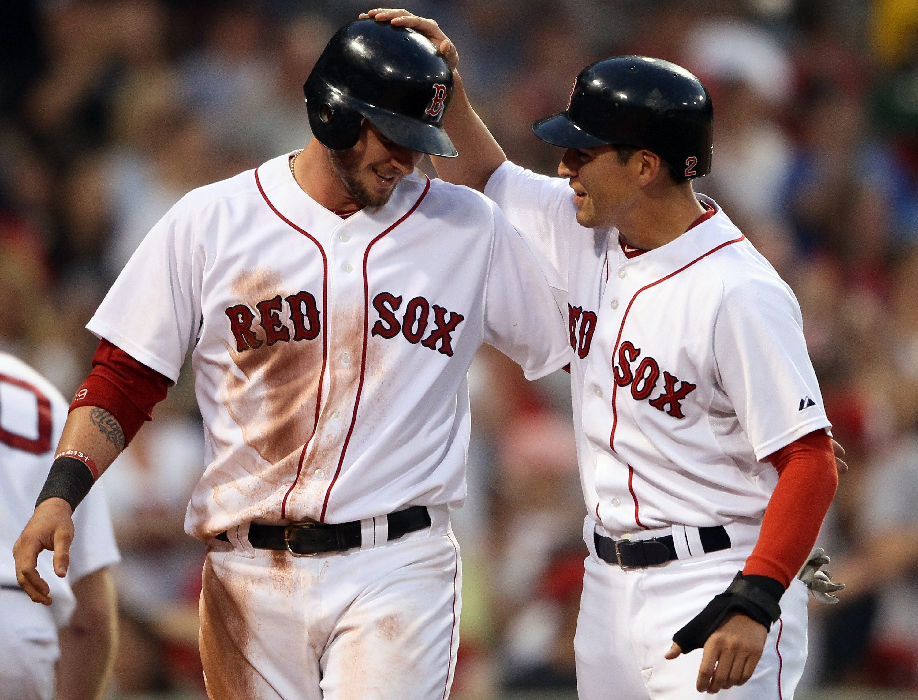 BOSTON, MA - MAY 30:  Jarrod Saltalamacchia #39 and Jacoby Ellsbury #2 of the Boston Red Sox celebrate after they scored off a single from teammate Dustin Pedroia in the third inning against the Chicago White Sox on May 30, 2011 at Fenway Park in Boston,