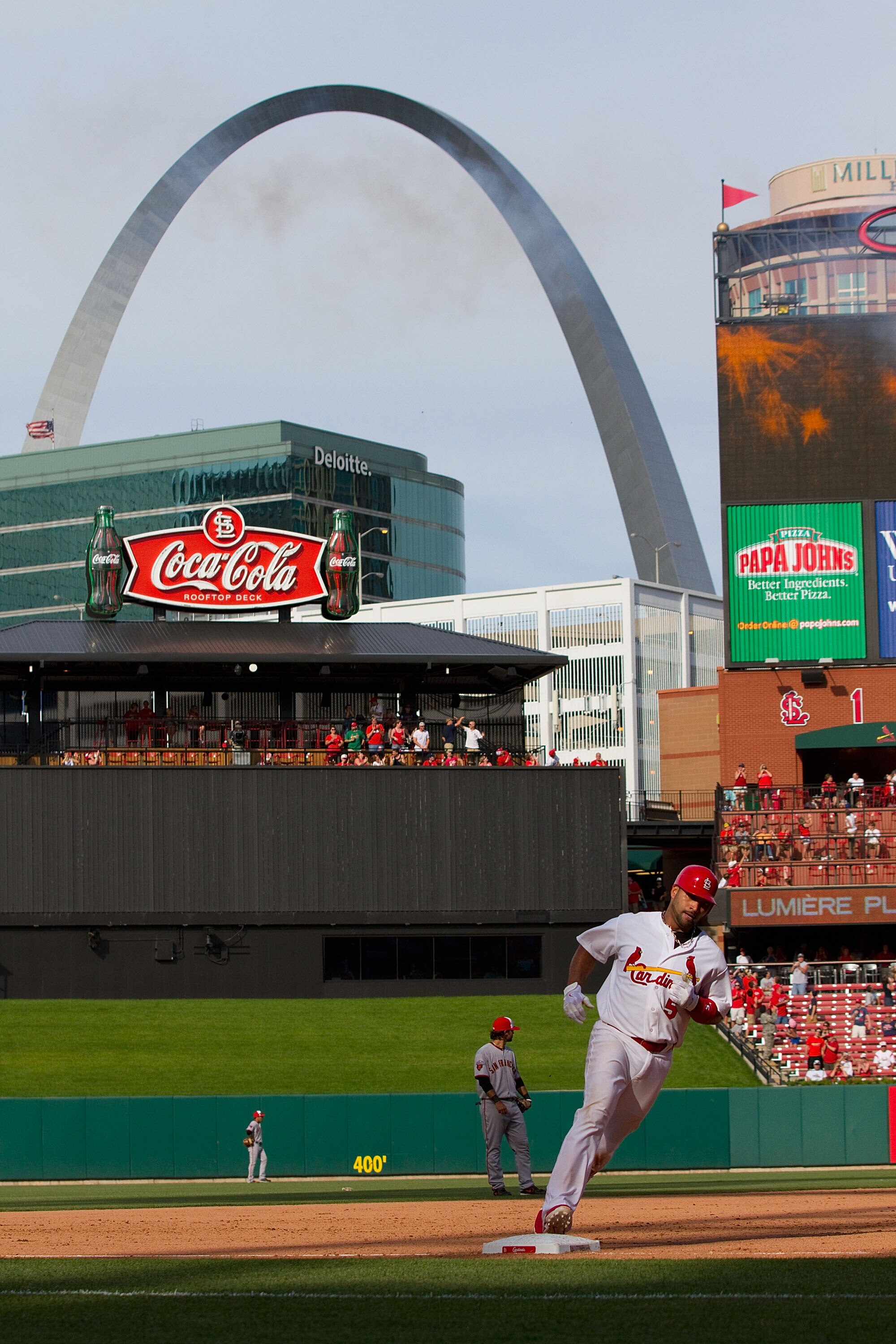 ST. LOUIS, MO - MAY 30: Albert Pujols #5 of the St. Louis Cardinals rounds the bases after hitting a solo home run against the San Francisco Giants at Busch Stadium on May 30, 2011 in St. Louis, Missouri.  (Photo by Dilip Vishwanat/Getty Images)