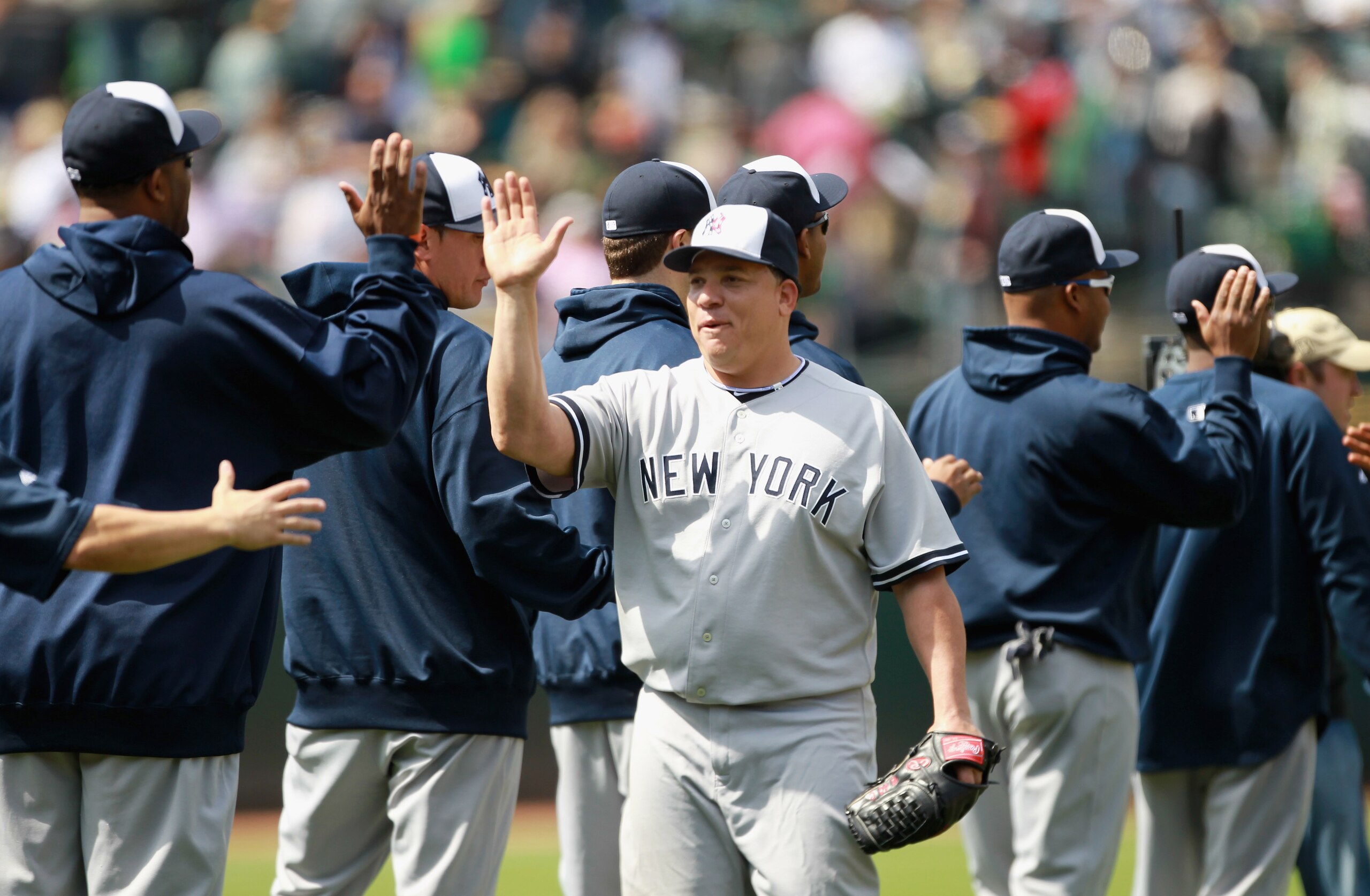 OAKLAND, CA - MAY 30: Bartolo Colon #40 of the New York Yankees is congratulated by teammates after he pitched a complete game shut out against the Oakland Athletics at Oakland-Alameda County Coliseum on May 30, 2011 in Oakland, California. (Photo by Ez OAKLAND, CA - MAY 30: Bartolo Colon #40 of the New York Yankees is congratulated by teammates after he pitched a complete game shut out against the Oakland Athletics at Oakland-Alameda County Coliseum on May 30, 2011 in Oakland, California. (Photo by Ez