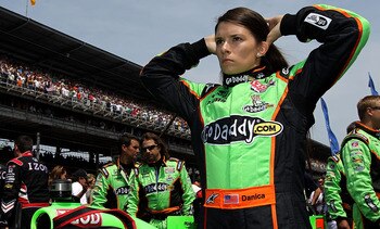 INDIANAPOLIS, IN - MAY 29:  Danica Patrick, driver of the #7 Team GoDaddy Dallara Honda, stands next to her car prior to the IZOD IndyCar Series Indianapolis 500 Mile Race at Indianapolis Motor Speedway on May 29, 2011 in Indianapolis, Indiana.  (Photo by
