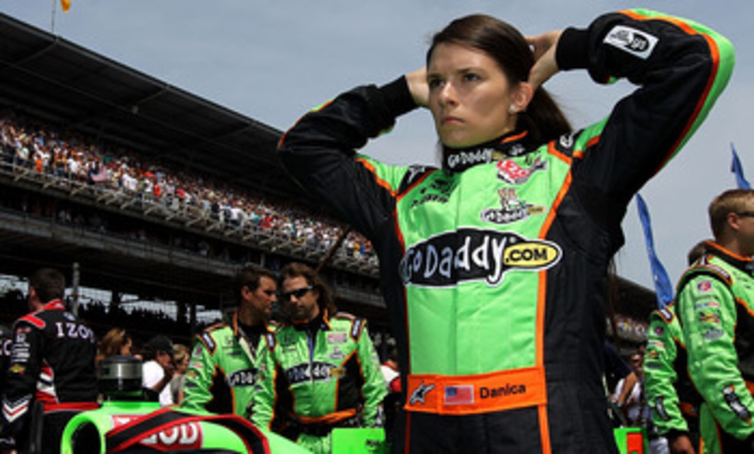 INDIANAPOLIS, IN - MAY 29:  Danica Patrick, driver of the #7 Team GoDaddy Dallara Honda, stands next to her car prior to the IZOD IndyCar Series Indianapolis 500 Mile Race at Indianapolis Motor Speedway on May 29, 2011 in Indianapolis, Indiana.  (Photo by
