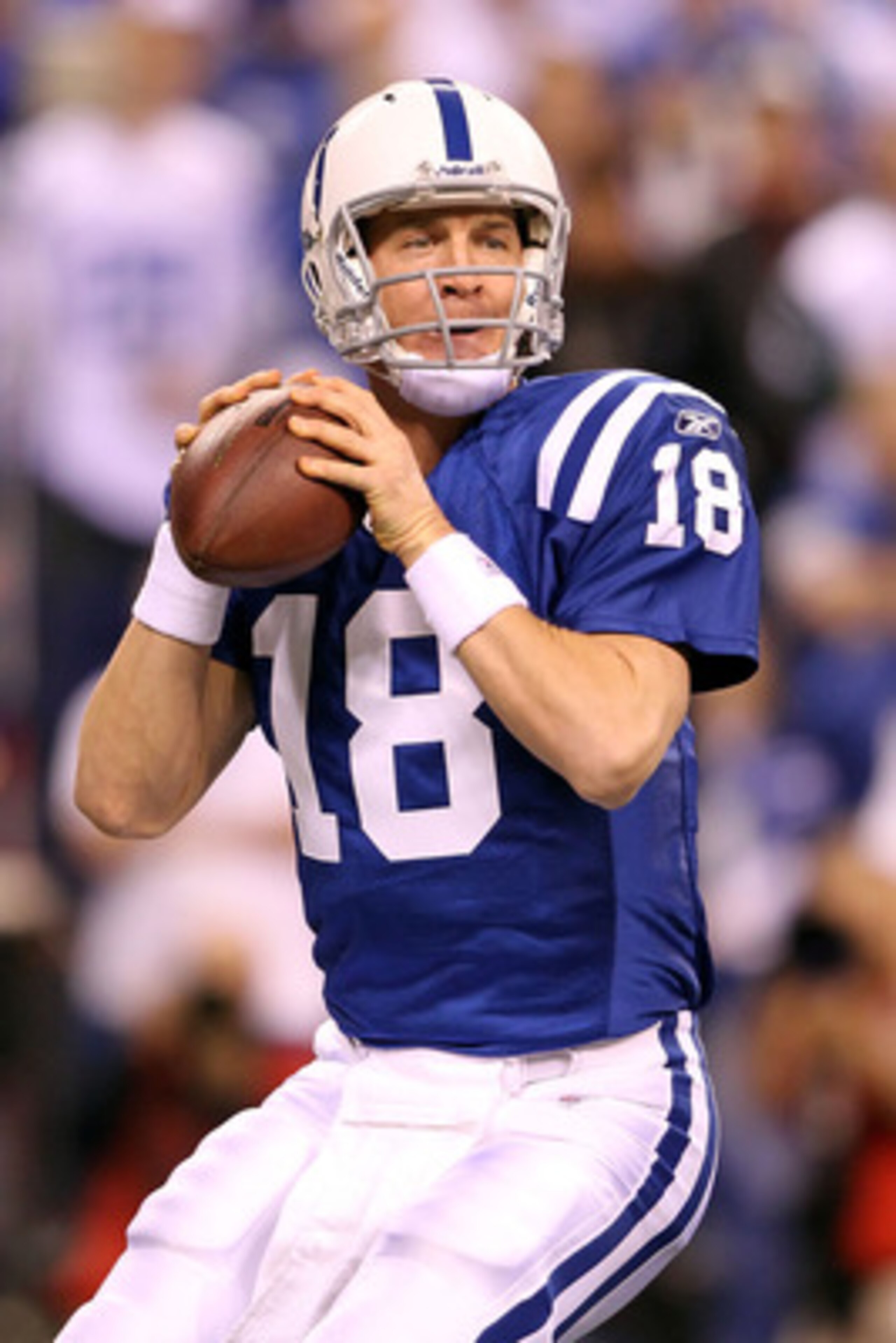 INDIANAPOLIS, IN - JANUARY 08: Quarterback Peyton Manning #18 of the Indianapolis Colts looks to pass in the first quarter against the New York Jets during their 2011 AFC wild card playoff game at Lucas Oil Stadium on January 8, 2011 in Indianapolis, Ind INDIANAPOLIS, IN - JANUARY 08: Quarterback Peyton Manning #18 of the Indianapolis Colts looks to pass in the first quarter against the New York Jets during their 2011 AFC wild card playoff game at Lucas Oil Stadium on January 8, 2011 in Indianapolis, Ind