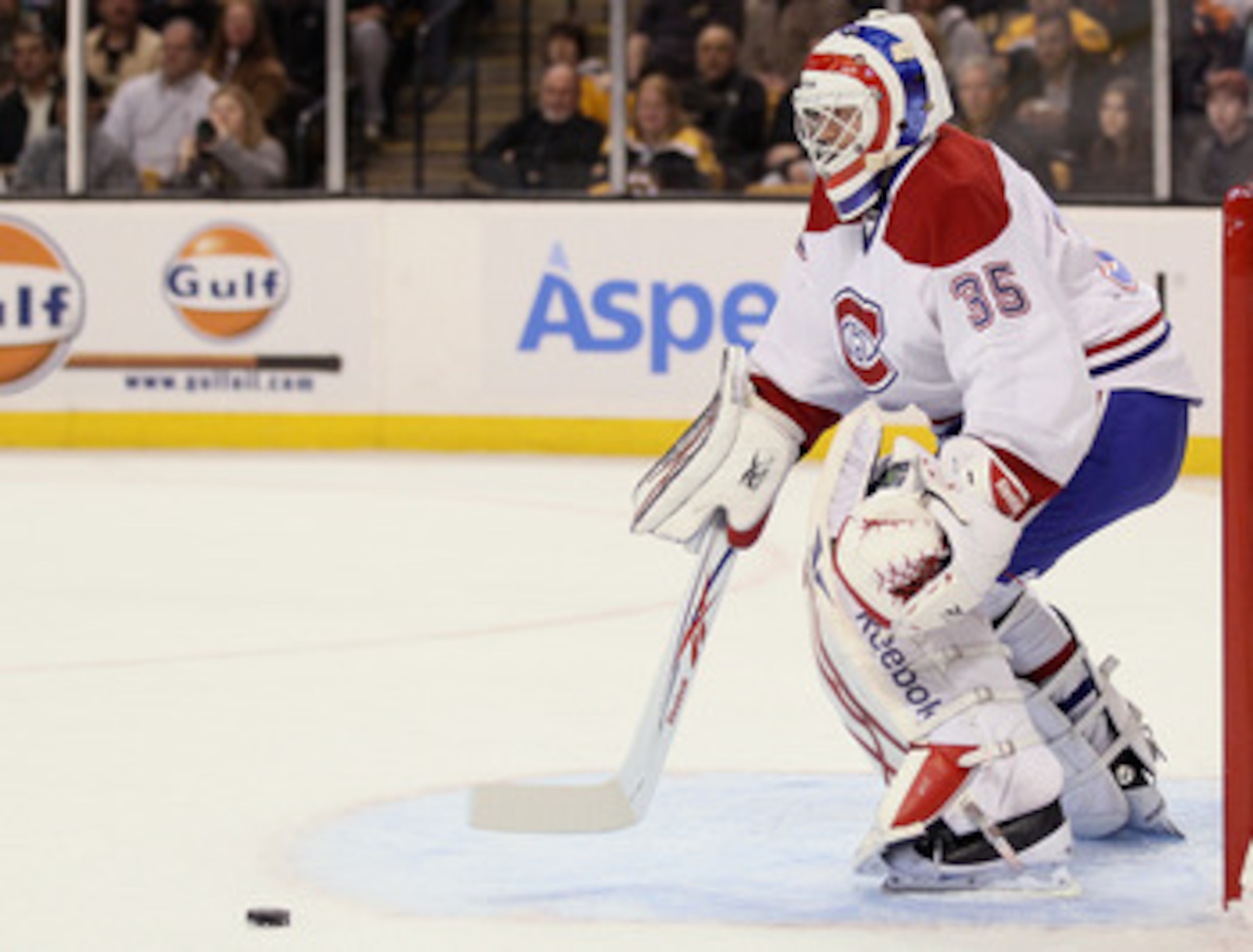 BOSTON, MA - MARCH 24:  Alex Auld #35 of the Montreal Canadiens stops a shot in the third period by the Boston Bruins on March 24, 2011 at the TD Garden in Boston, Massachusetts.  The Boston Bruins defeated the Montreal Canadiens 7-0.  (Photo by Elsa/Gett