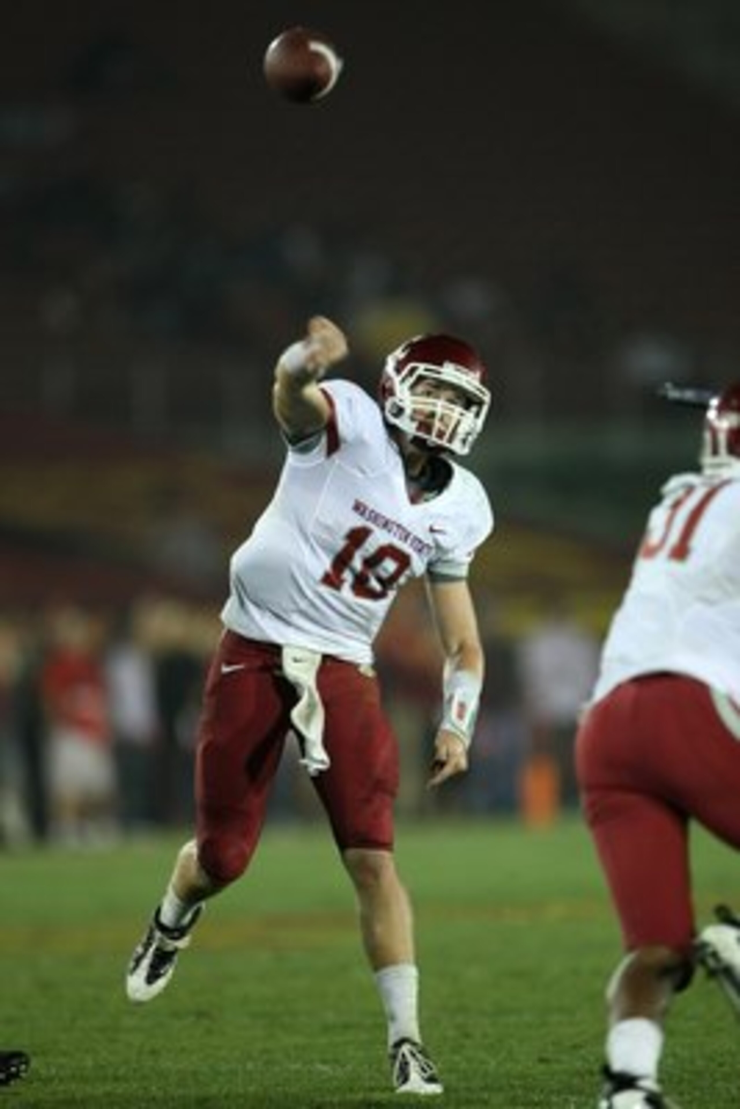 LOS ANGELES, CA - SEPTEMBER 26:  Quarterback Jeff Tuel #10 of the Washington State Cougars throws a pass against the USC Trojans on September 23, 2009 at the Los Angeles Coliseum in Los Angeles, California.  USC won 27-6.  (Photo by Stephen Dunn/Getty Ima