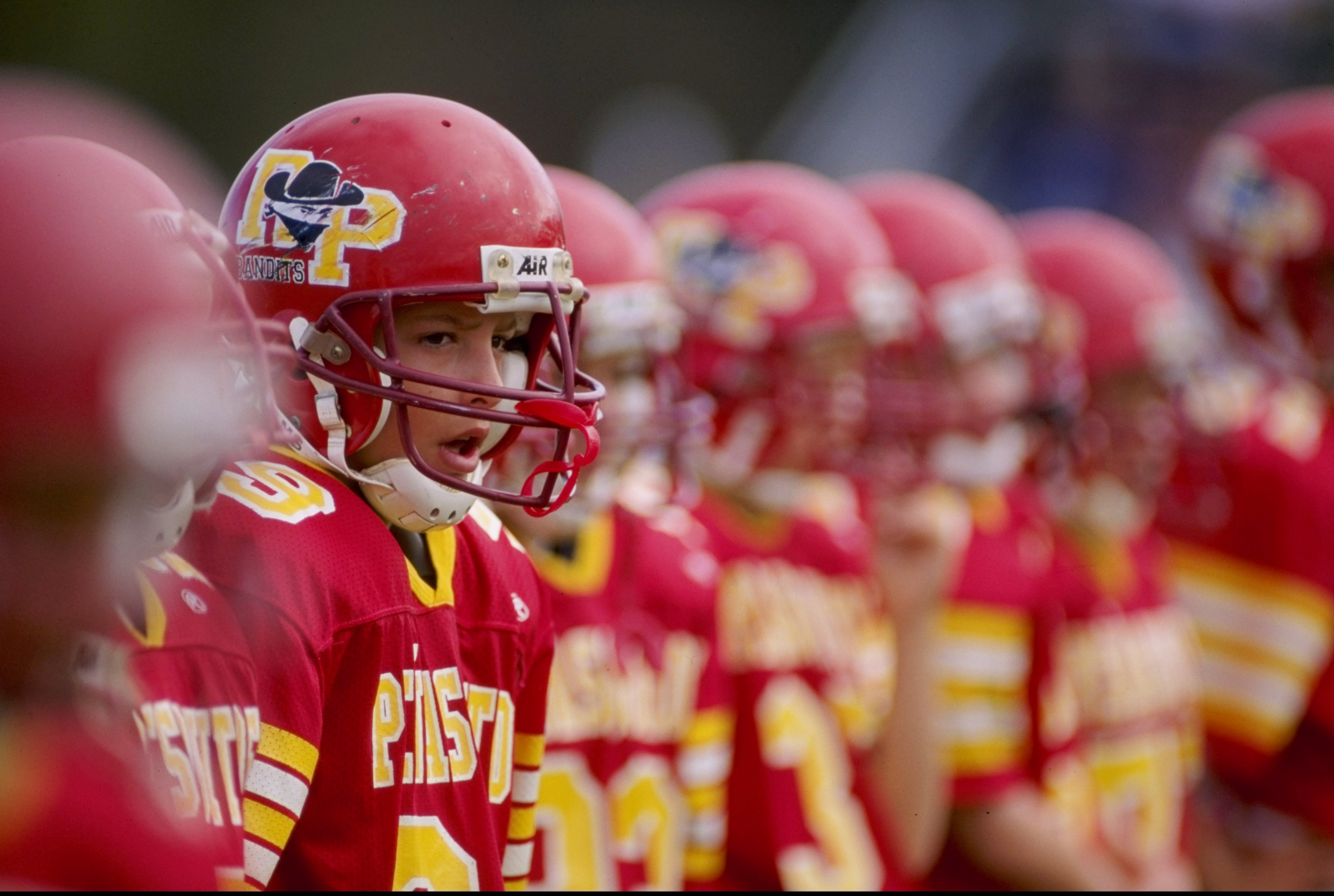 9 Dec 1998:  General view of players from Rancho Penasquitos, California looking on during the Pop Warner Pee Wee Football Super Bowl at Disney Wide World of Sports Complex in Orlando, Florida. Mandatory Credit: Scott Halleran  /Allsport