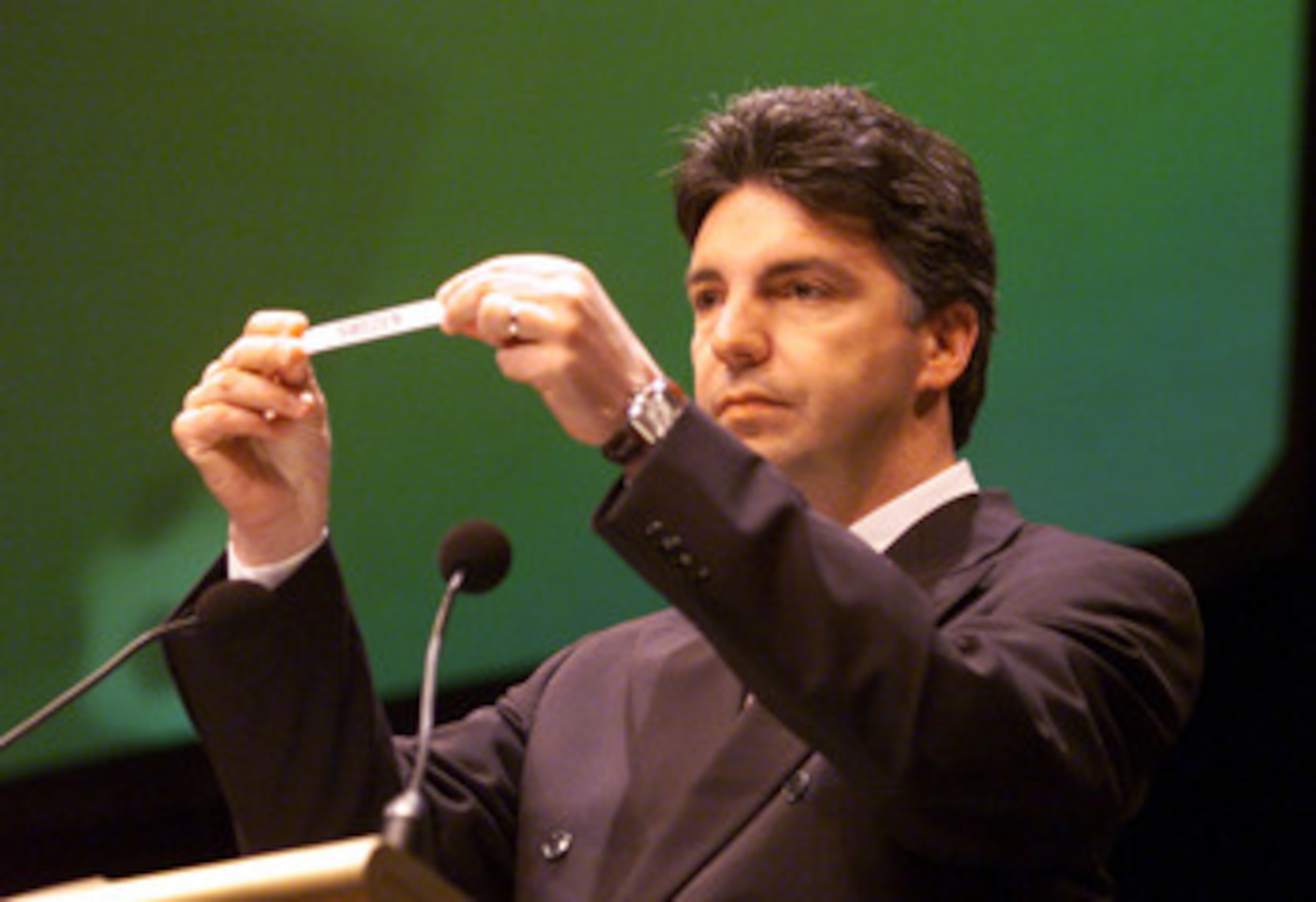03 Jun 2000:  Secretary-General of FIFA  Michel Zen-Ruffinen holds up the name of Sweden after they are drawn  during the Sydney 2000 Olympic Games Football Draw held at the Sydney Town Hall, Sydney Australia.DIGITAL IMAGE. Mandatory Credit: Scott Barbour