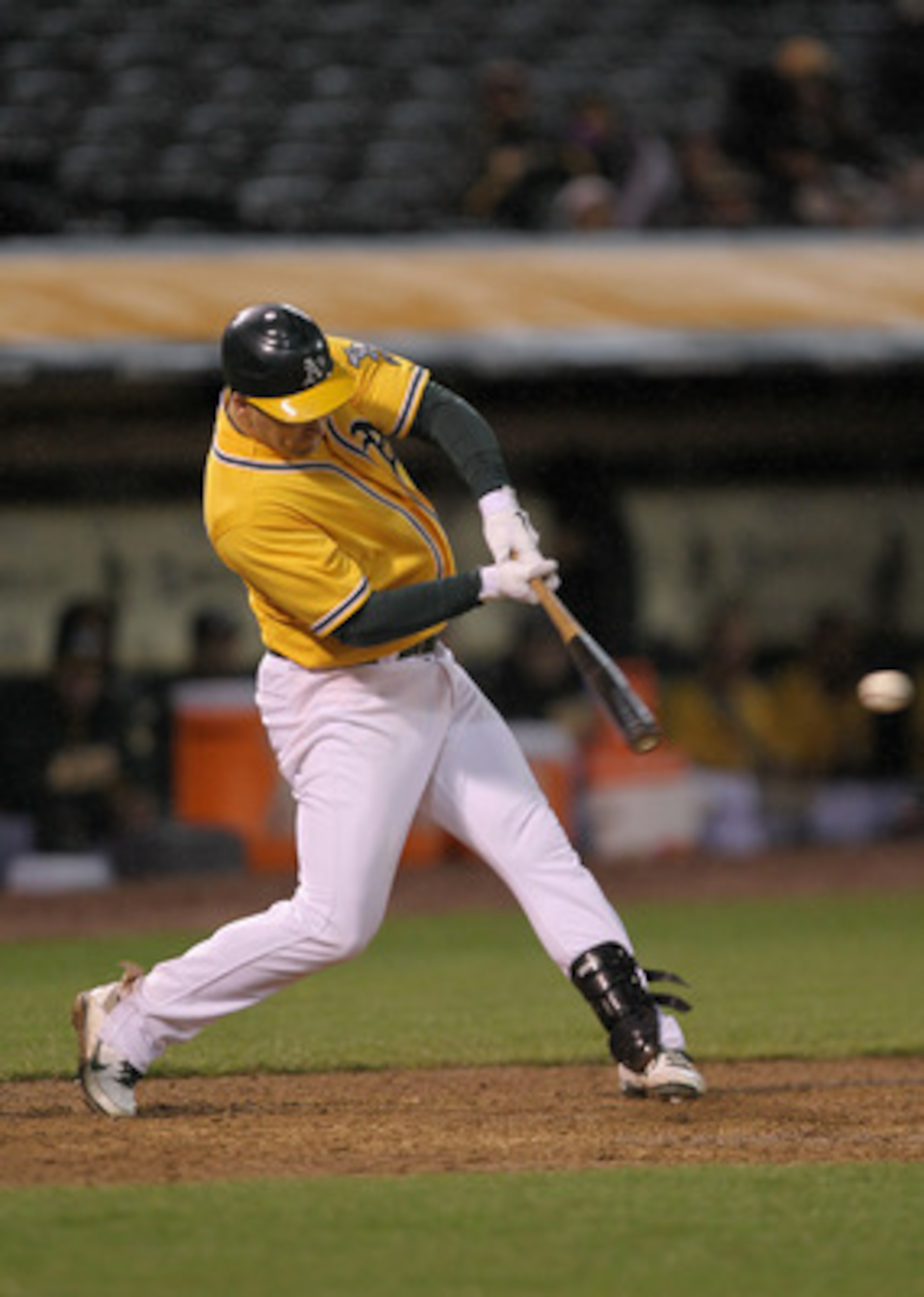 OAKLAND, CA - MAY 17:  Josh Willingham #16 of the Oakland Athletics singles in two runs in the sixth inning to put the Athletics up 14-0 over the Los Angeles Angels of Anaheim at Oakland-Alameda County Coliseum on May 17, 2011 in Oakland, California.  (Ph
