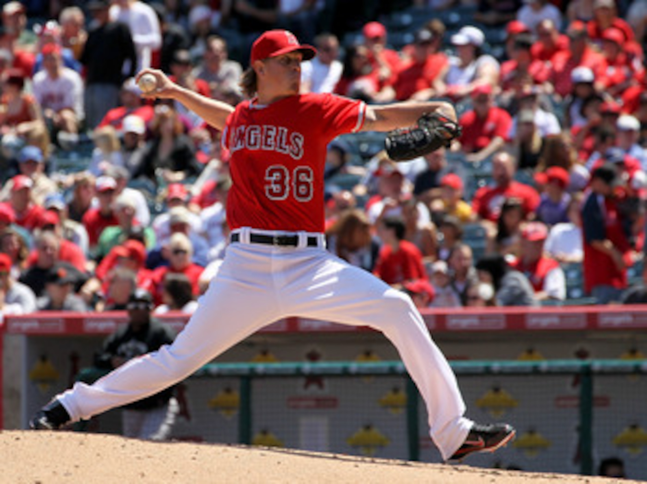 ANAHEIM, CA - APRIL 10:  Jered Weaver #36 of the Los Angeles Angels of Anaheim throws a pitch against the Toronto Blue Jays on April 10, 2011 at Angel Stadium in Anaheim, California.  (Photo by Stephen Dunn/Getty Images)