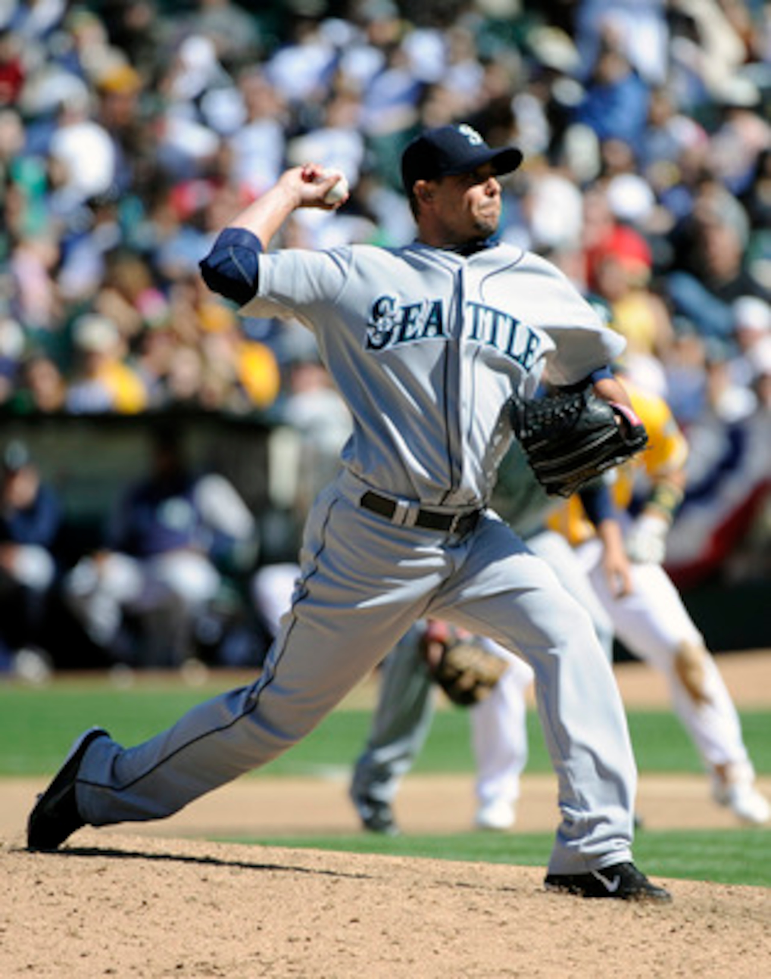 OAKLAND, CA - APRIL 3: David Pauley #39 of the Seattle Mariners pitches against the Oakland Athletics during a MLB baseball game at the Oakland-Alameda County Coliseum April 3, 2011 in Oakland, California.  (Photo by Thearon W. Henderson/Getty Images)