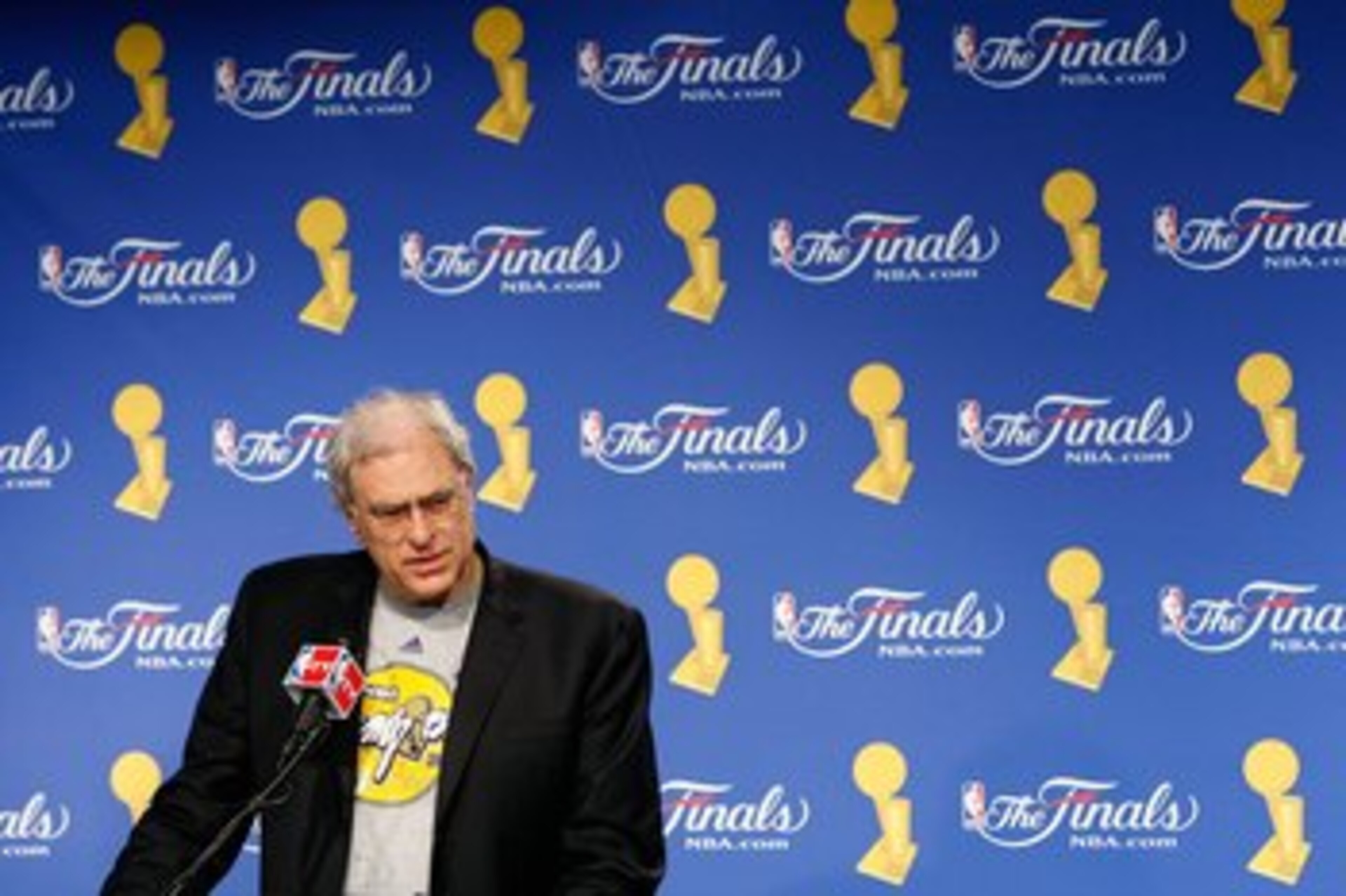 ORLANDO, FL - JUNE 14: Head coach Phil Jackson of the Los Angeles Lakers speaks to the media after the Lakers defeated the Orlando Magic in Game Five of the 2009 NBA Finals on June 14, 2009 at Amway Arena in Orlando, Florida. The Lakers won 99-86. NOTE ORLANDO, FL - JUNE 14: Head coach Phil Jackson of the Los Angeles Lakers speaks to the media after the Lakers defeated the Orlando Magic in Game Five of the 2009 NBA Finals on June 14, 2009 at Amway Arena in Orlando, Florida. The Lakers won 99-86. NOTE