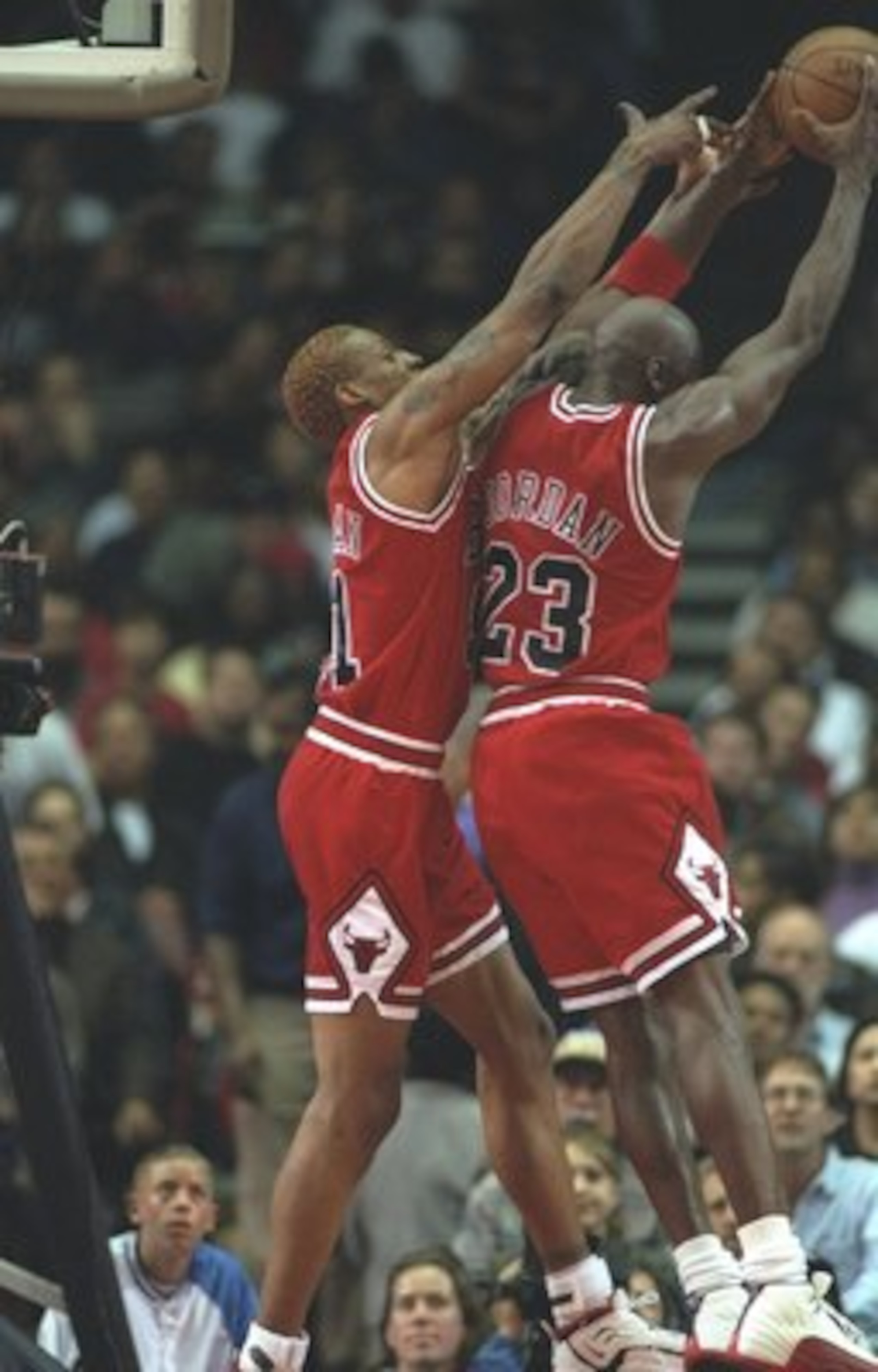 25 Nov 1996:  Chicago Bulls guard Michael Jordan (right) and forward Dennis Rodman go up for a rebound during a game against the Los Angeles Clippers at the Sports Arena in Los Angeles, California.  The Bulls won the game, 88-84.     Mandatory Credit: J.