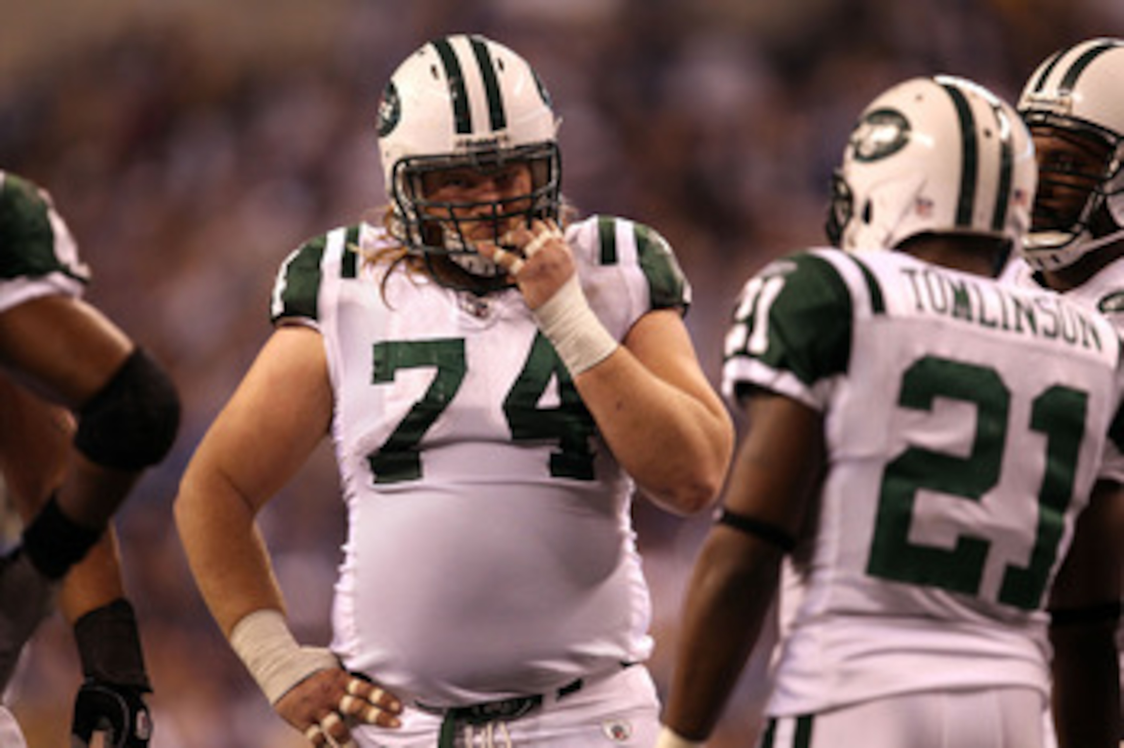 INDIANAPOLIS, IN - JANUARY 08: Nick Mangold #74 of the New York Jets looks on against the Indianapolis Colts during their 2011 AFC wild card playoff game at Lucas Oil Stadium on January 8, 2011 in Indianapolis, Indiana. The Jets won 17-16. (Photo by Jona INDIANAPOLIS, IN - JANUARY 08: Nick Mangold #74 of the New York Jets looks on against the Indianapolis Colts during their 2011 AFC wild card playoff game at Lucas Oil Stadium on January 8, 2011 in Indianapolis, Indiana. The Jets won 17-16. (Photo by Jona