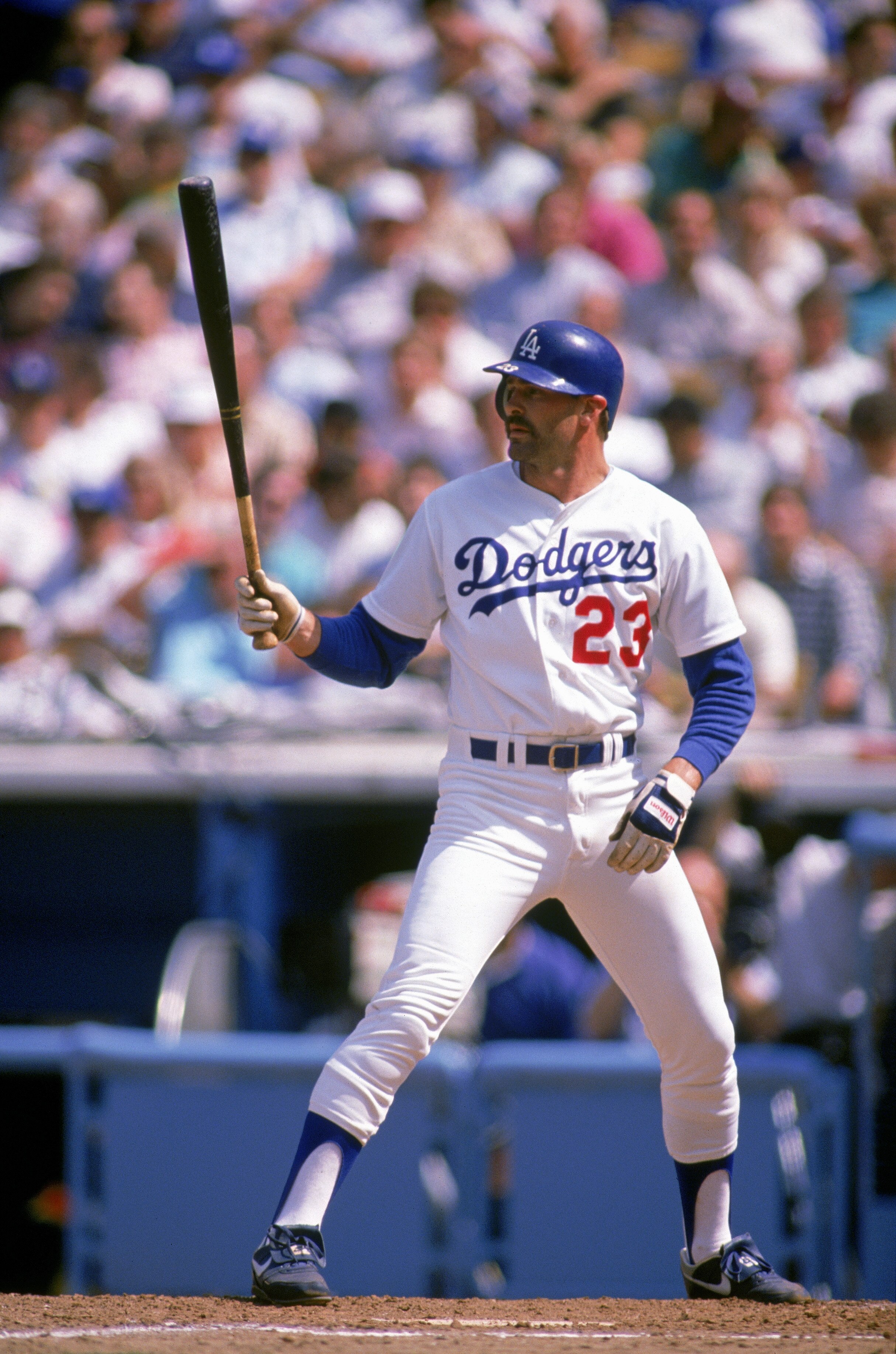 LOS ANGELES - 1989:  Kirk Gibson #23 of the Los Angeles Dodgers waits for the pitch during a 1989 game at Dodger Stadium in Los Angeles, California. (Photo by Mike Powell/Getty Images)