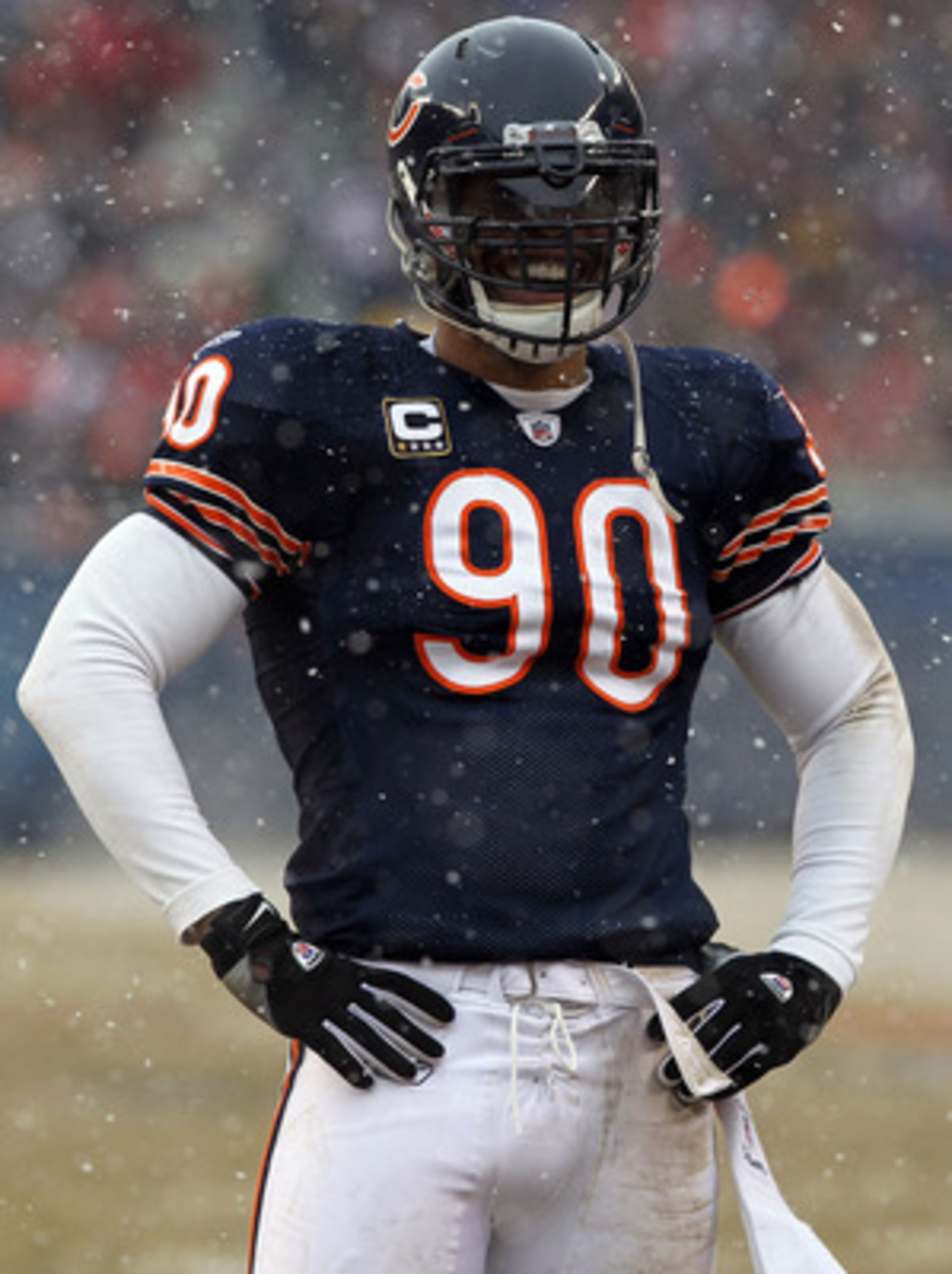 CHICAGO, IL - JANUARY 16: Julius Peppers #90 of the Chicago Bears smiles in the first half against the Seattle Seahawks in the 2011 NFC divisional playoff game at Soldier Field on January 16, 2011 in Chicago, Illinois. (Photo by Doug Pensinger/Getty Ima CHICAGO, IL - JANUARY 16: Julius Peppers #90 of the Chicago Bears smiles in the first half against the Seattle Seahawks in the 2011 NFC divisional playoff game at Soldier Field on January 16, 2011 in Chicago, Illinois. (Photo by Doug Pensinger/Getty Ima