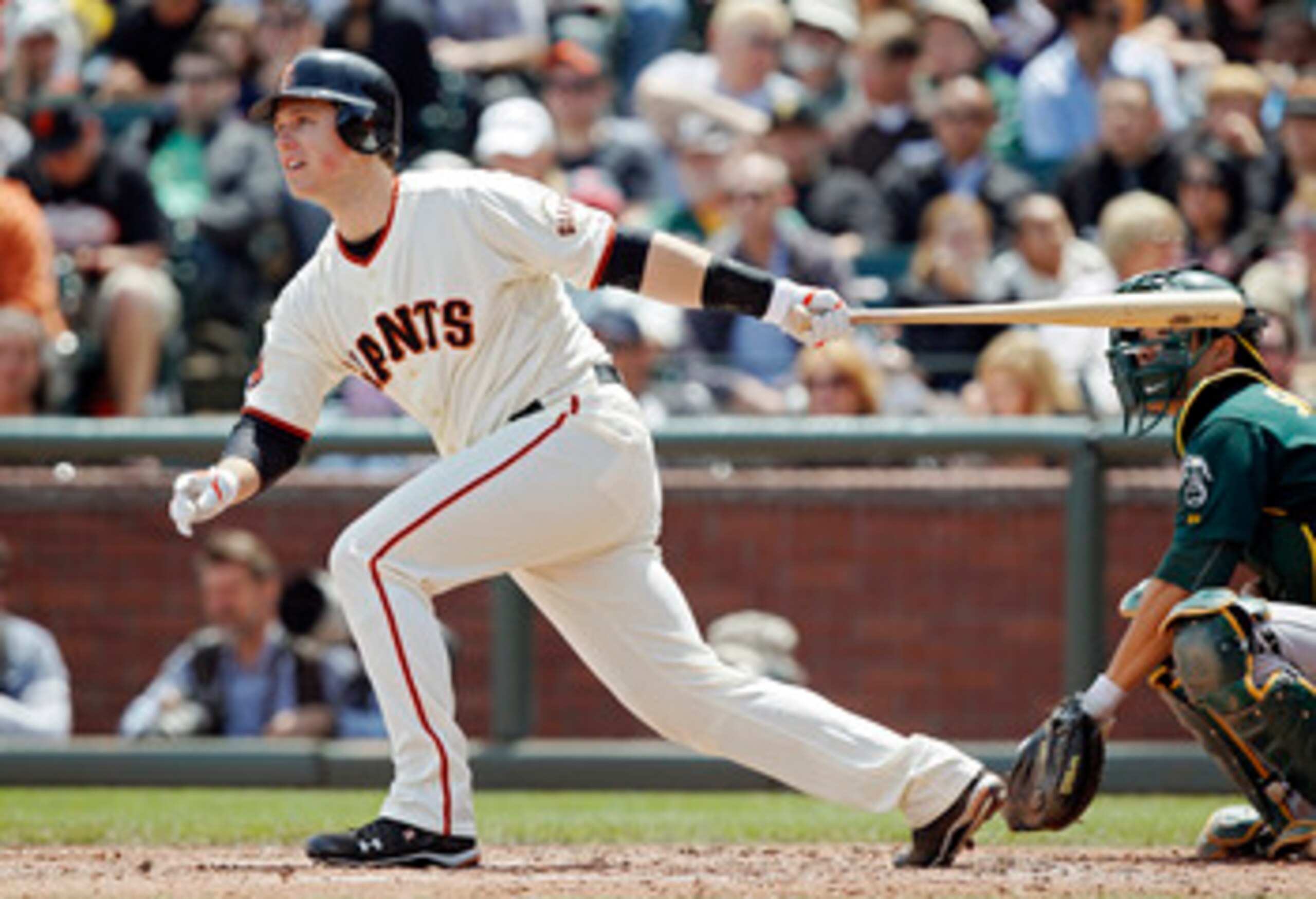 SAN FRANCISCO, CA - MAY 22: Buster Posey #28 of the San Francisco Giants singles to left field against the Oakland A's in the third inning at AT&T Park on May 22, 2011 in San Francisco, California. The Giants won 5-4 in 11 innings. (Photo by Brian Bah SAN FRANCISCO, CA - MAY 22: Buster Posey #28 of the San Francisco Giants singles to left field against the Oakland A's in the third inning at AT&T Park on May 22, 2011 in San Francisco, California. The Giants won 5-4 in 11 innings. (Photo by Brian Bah