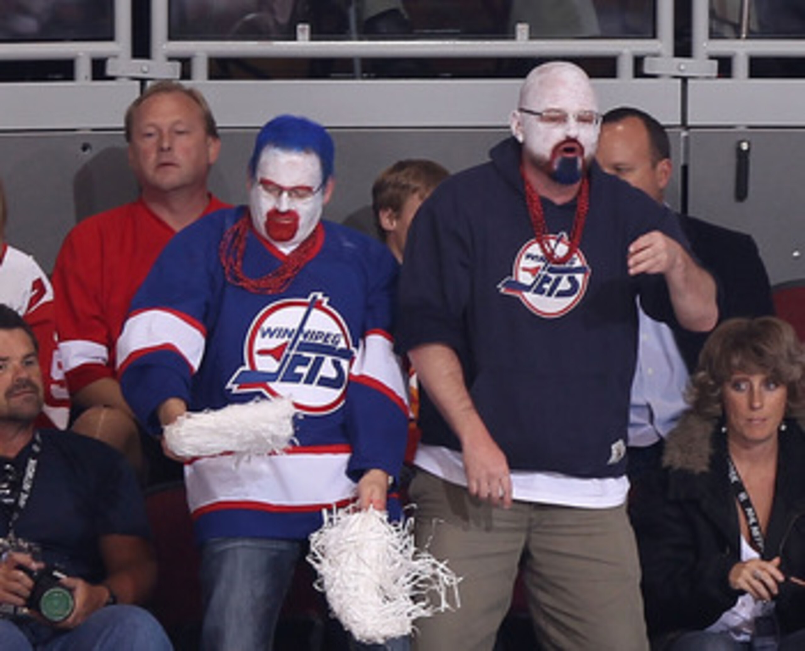 GLENDALE, AZ - APRIL 20:  Fans dressed in Winnipeg Jets uniforms attend Game Four of the Western Conference Quarterfinals between the Detroit Red Wings and the Phoenix Coyotes during the 2011 NHL Stanley Cup Playoffs at Jobing.com Arena on April 20, 2011 