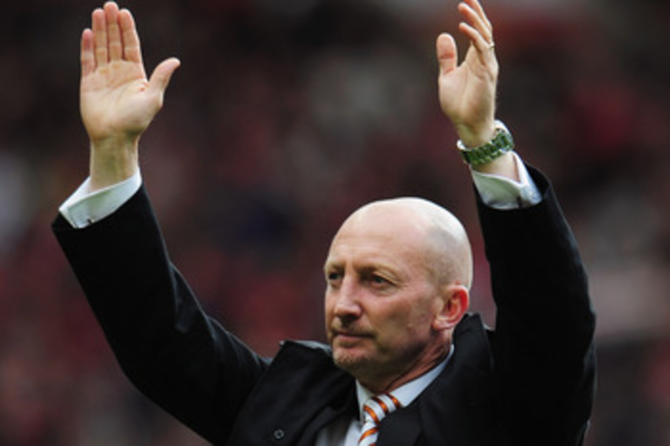MANCHESTER, ENGLAND - MAY 22: A dejected Ian Holloway manager of Blackpool salutes the fans as Blackpool are relegated after the Barclays Premier League match between Manchester United and Blackpool at Old Trafford on May 22, 2011 in Manchester, England. MANCHESTER, ENGLAND - MAY 22: A dejected Ian Holloway manager of Blackpool salutes the fans as Blackpool are relegated after the Barclays Premier League match between Manchester United and Blackpool at Old Trafford on May 22, 2011 in Manchester, England.