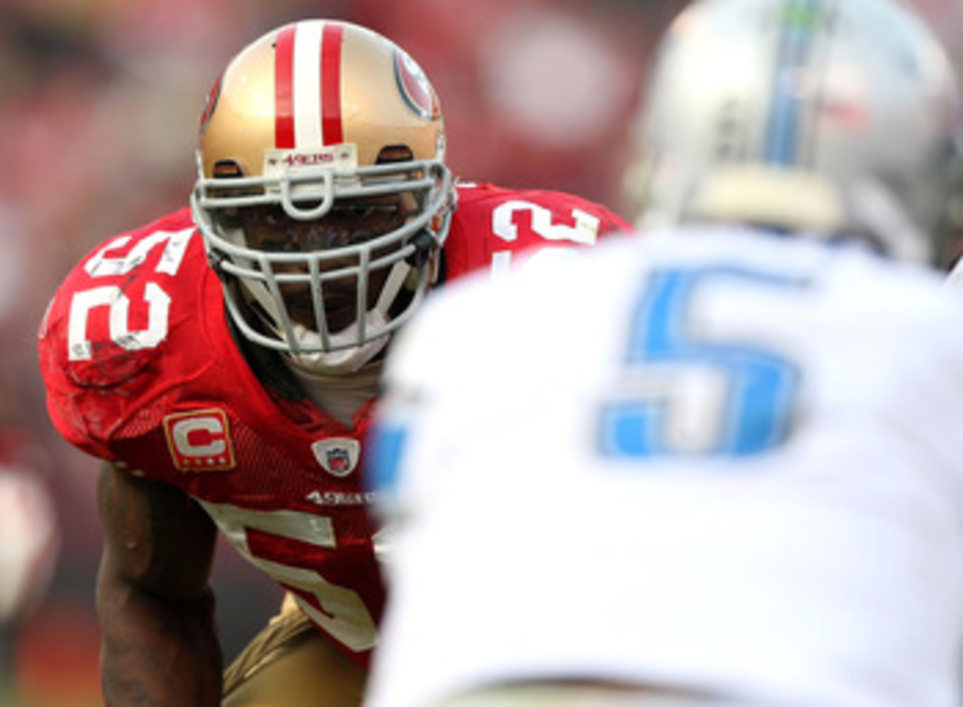 SAN FRANCISCO - DECEMBER 27: Patrick Willis #52 of the San Francisco 49ers eyes quarterback Drew Stanton #5 of the Detroit Lions before a play during an NFL game at Candlestick Park on December 27, 2009 in San Francisco, California. (Photo by Jed Jacobso SAN FRANCISCO - DECEMBER 27: Patrick Willis #52 of the San Francisco 49ers eyes quarterback Drew Stanton #5 of the Detroit Lions before a play during an NFL game at Candlestick Park on December 27, 2009 in San Francisco, California. (Photo by Jed Jacobso