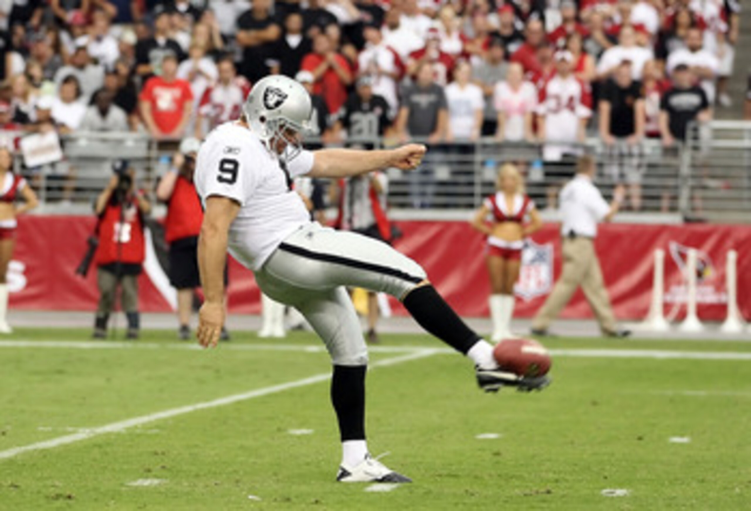 GLENDALE, AZ - SEPTEMBER 26:  Punter Shane Lechler #9 of the Oakland Raiders kicks the ball during the NFL game against the Arizona Cardinals at the University of Phoenix Stadium on September 26, 2010 in Glendale, Arizona.  The Cardinals defeated the Raid