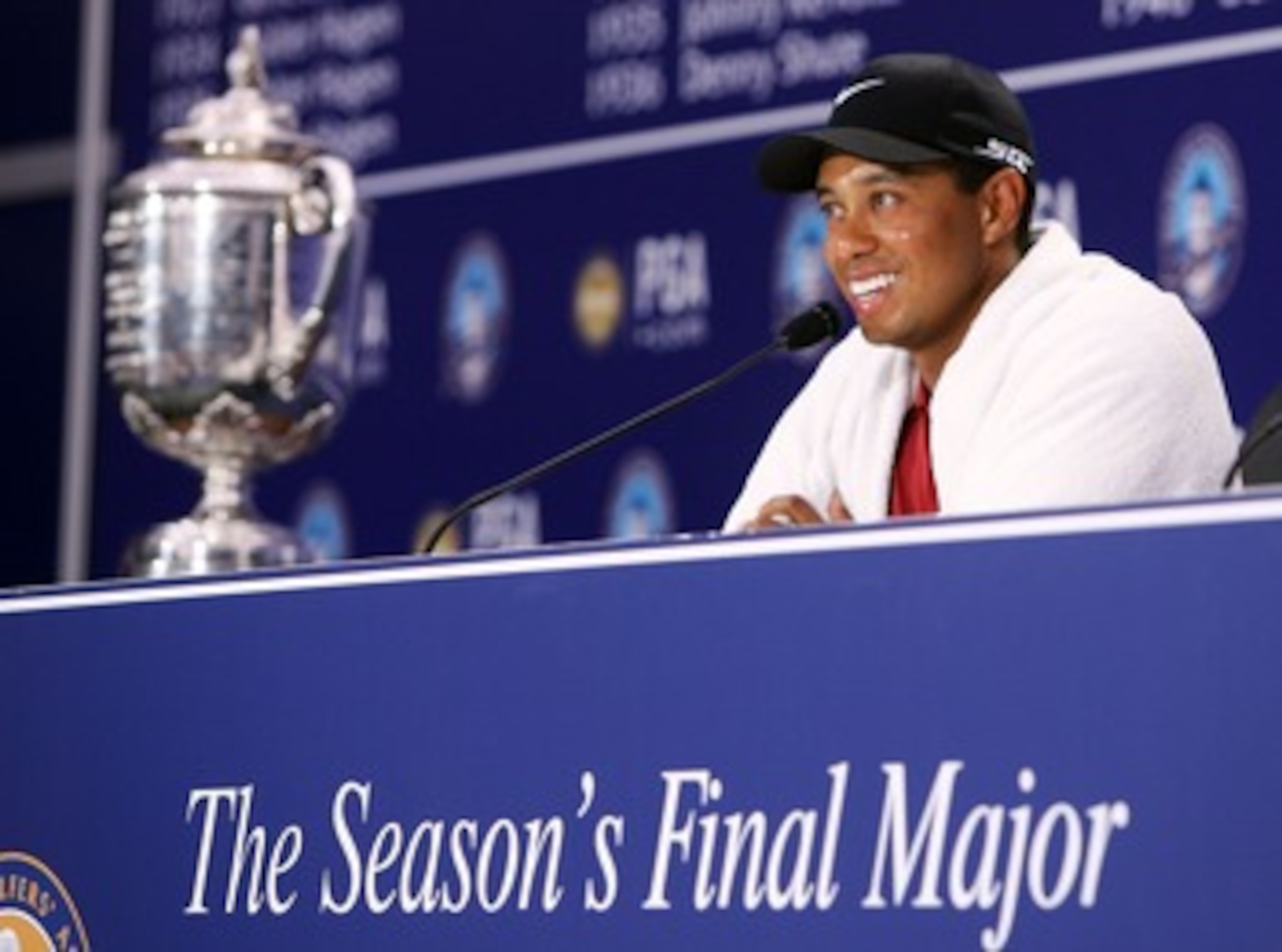 TULSA, OK - AUGUST 12:  Tiger Woods chats with the media after his two-stroke victory at the 89th PGA Championship at the Southern Hills Country Club on August 12, 2007 in Tulsa, Oklahoma.  (Photo by Jeff Gross/Getty Images)