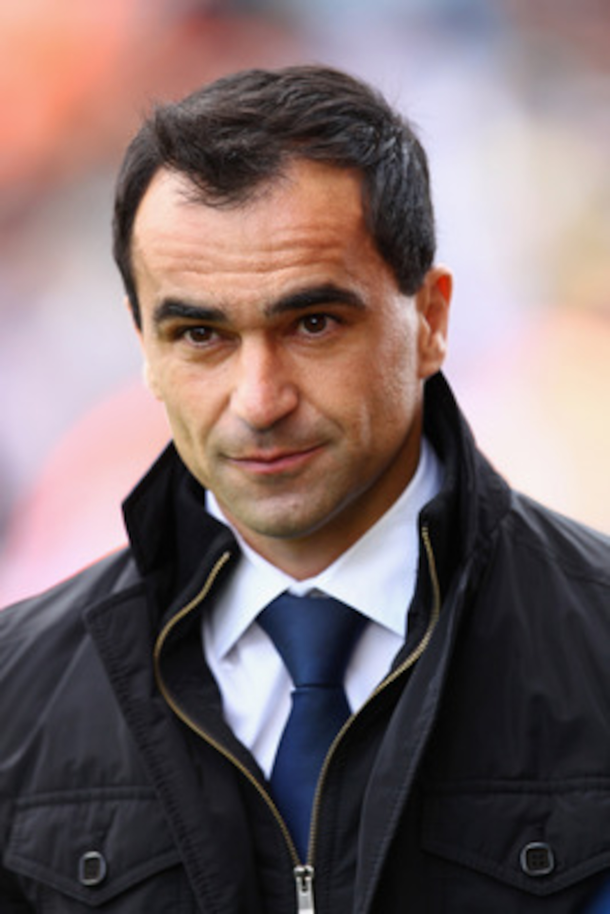 STOKE ON TRENT, ENGLAND - MAY 22: Manager Roberto Martinez of Wigan walks onto the pitch ahead of the Barclays Premier League match between Stoke City and Wigan Athletic at Britannia Stadium on May 22, 2011 in Stoke on Trent, England. (Photo by Richard STOKE ON TRENT, ENGLAND - MAY 22: Manager Roberto Martinez of Wigan walks onto the pitch ahead of the Barclays Premier League match between Stoke City and Wigan Athletic at Britannia Stadium on May 22, 2011 in Stoke on Trent, England. (Photo by Richard